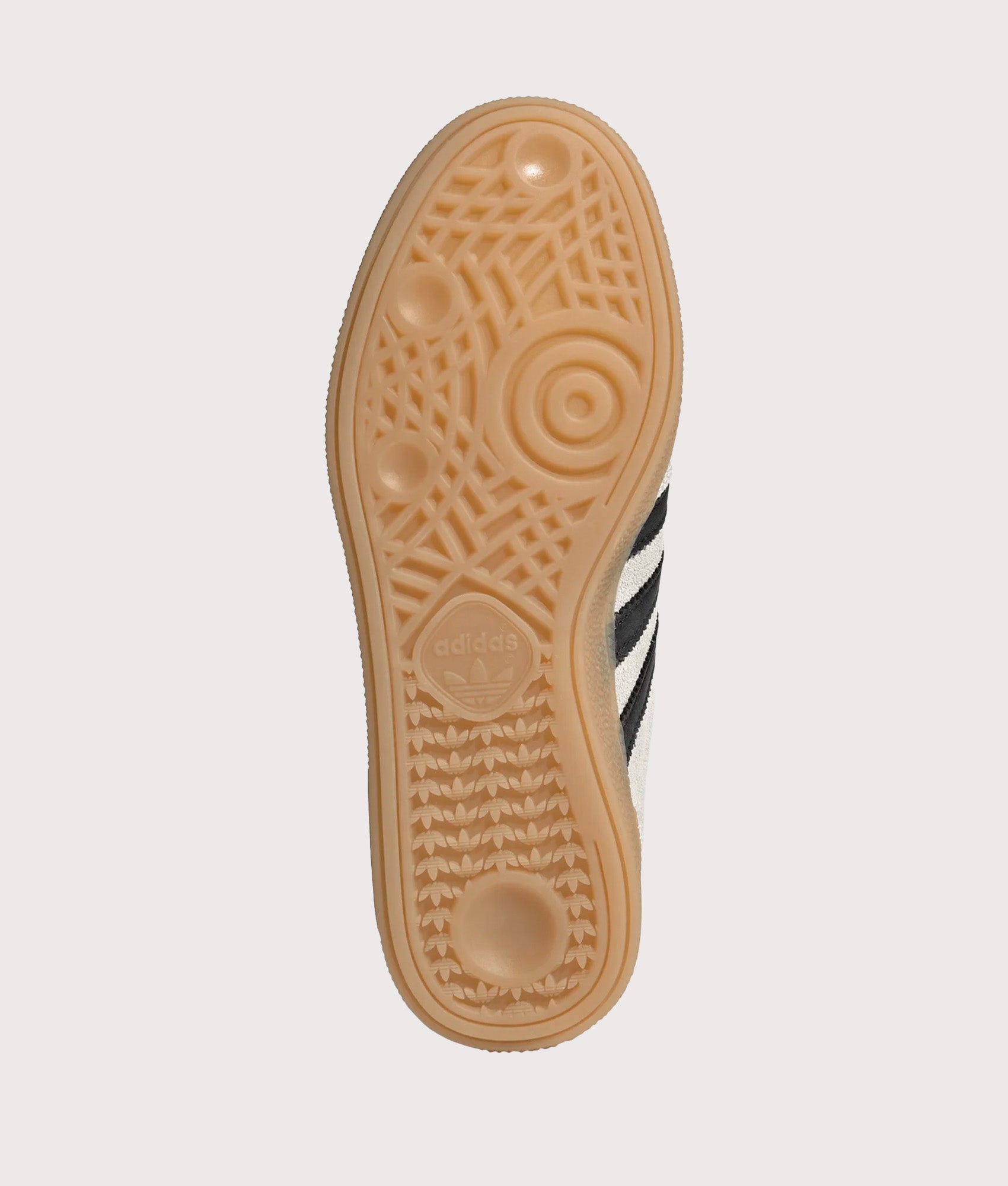 adidas Originals Handball Spezial Trainers in Cloud White, Core Black and Gold Metallic at EQVVS Menswear. Tread shot.