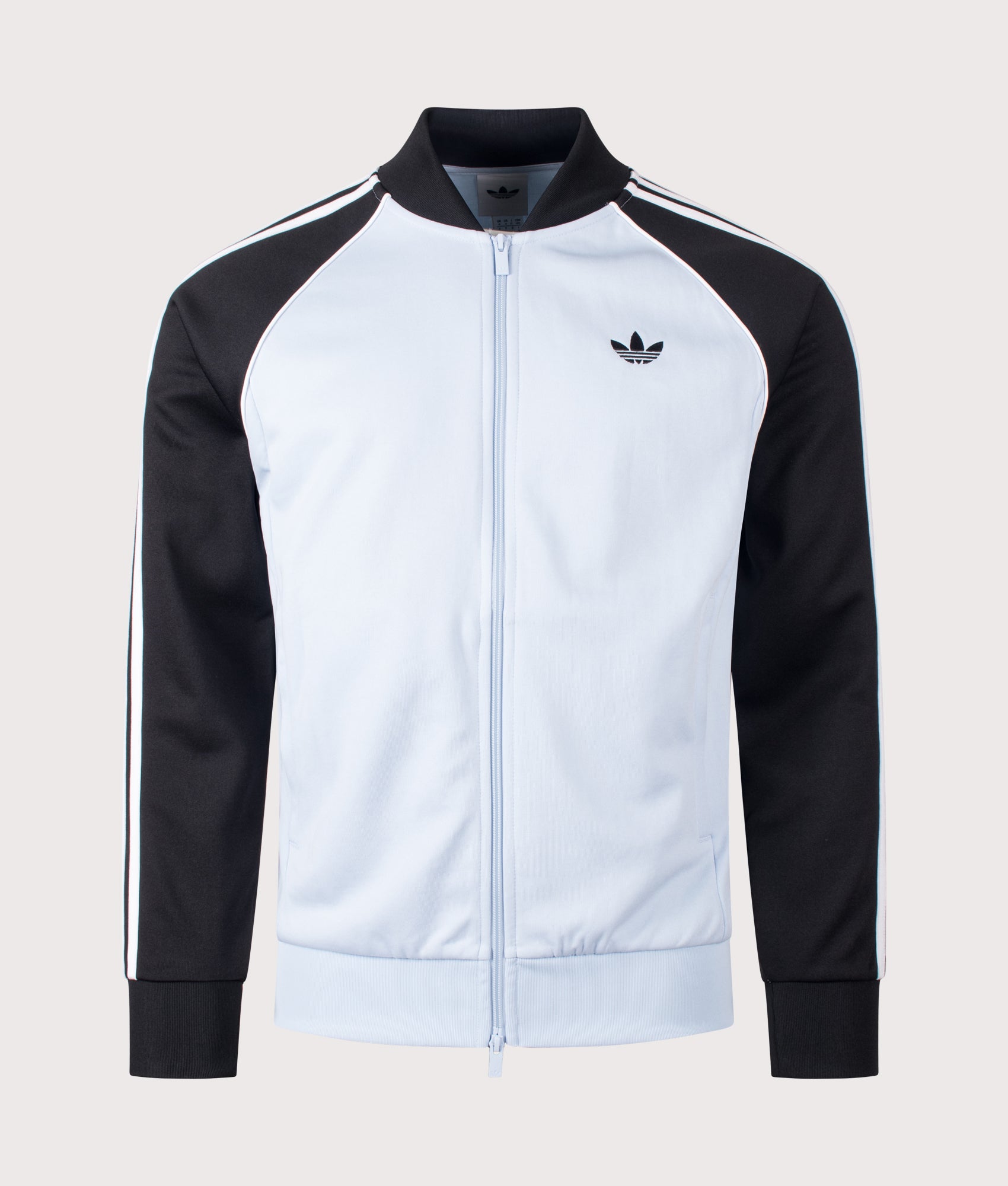 SST Track Top in Crystal Sky by adidas Originals. Shot by EQVVS. Front shot.