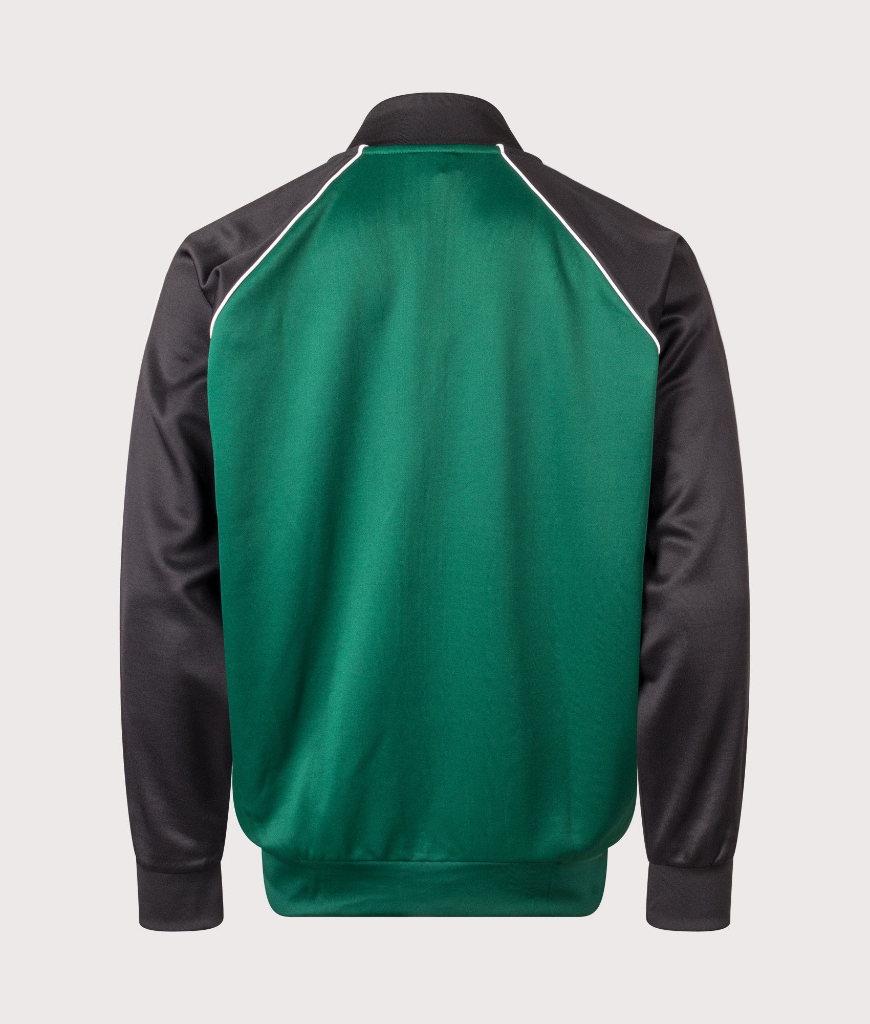 adidas Originals SST Track Top in Collegiate Green at EQVVS Menswear. Back shot.