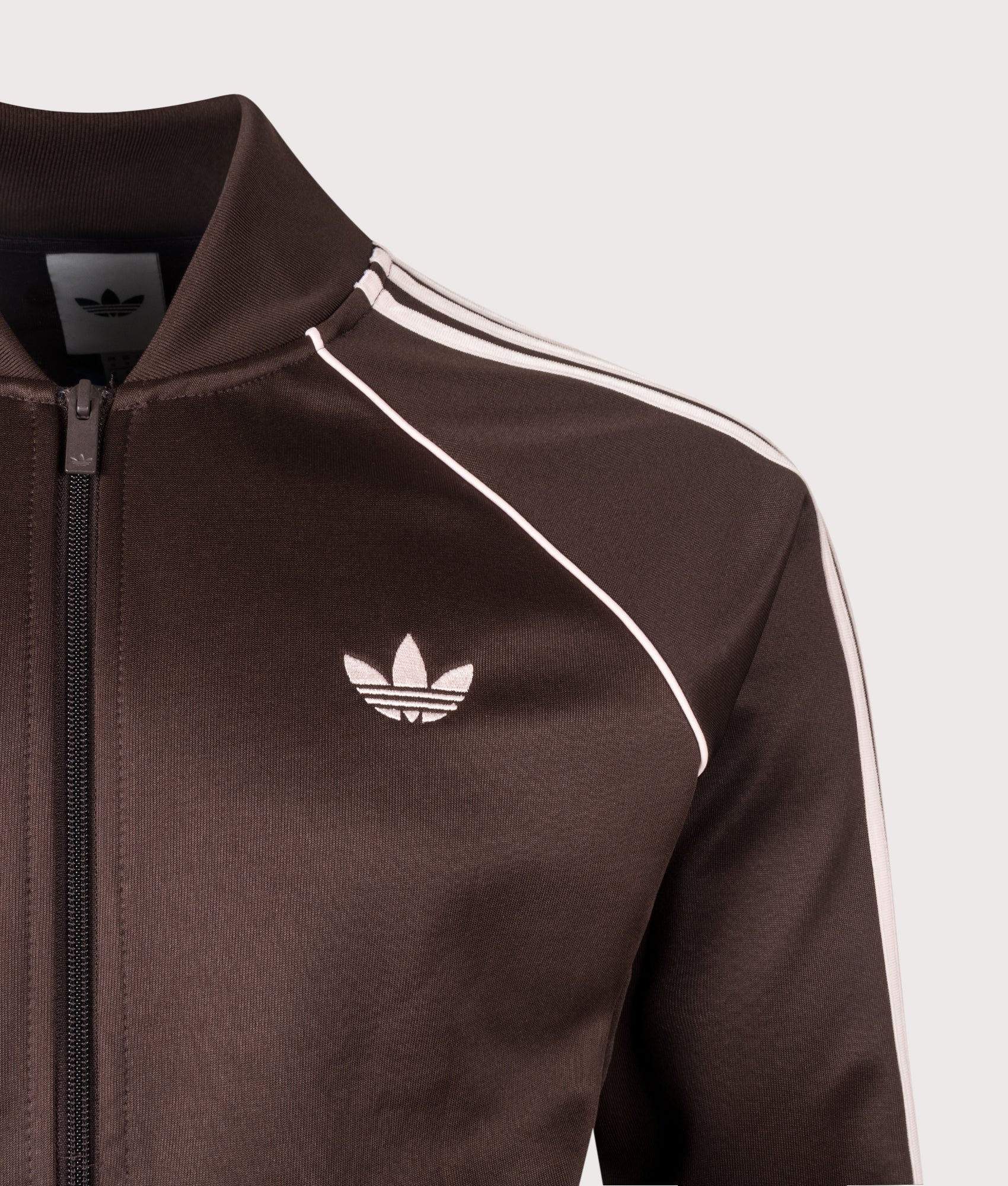 SST Track Top in Aurora Coffee by adidas Originals. Shot by EQVVS. Detail shot.