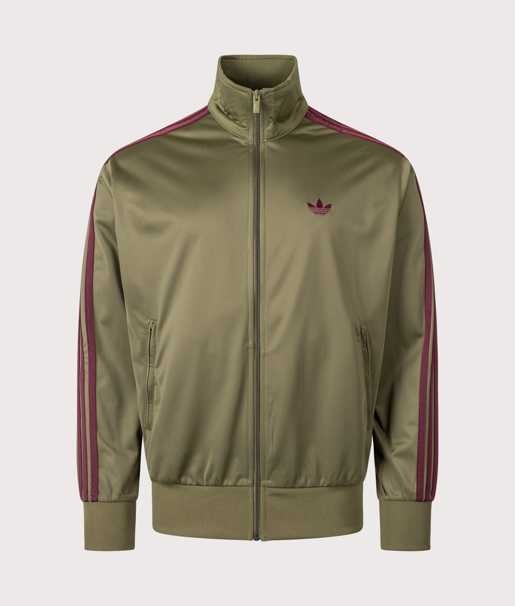 adidas Originals Firebird Track Top in Focus Olive and Maroon at EQVVS menswear. Front shot.