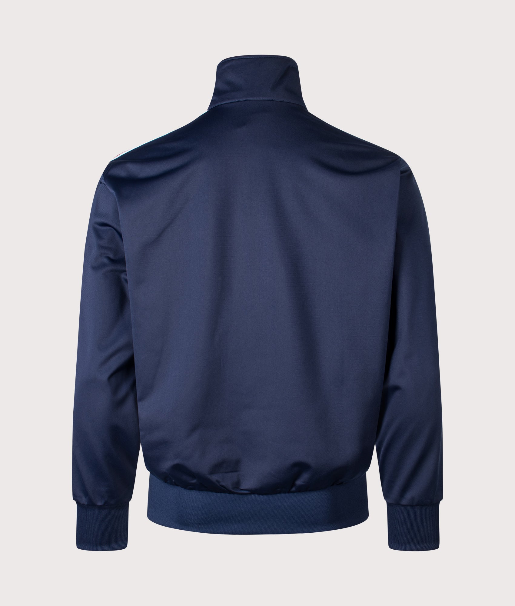 adidas Originals Firebird track top in Night Indigo at EQVVS Menswear. Back shot.