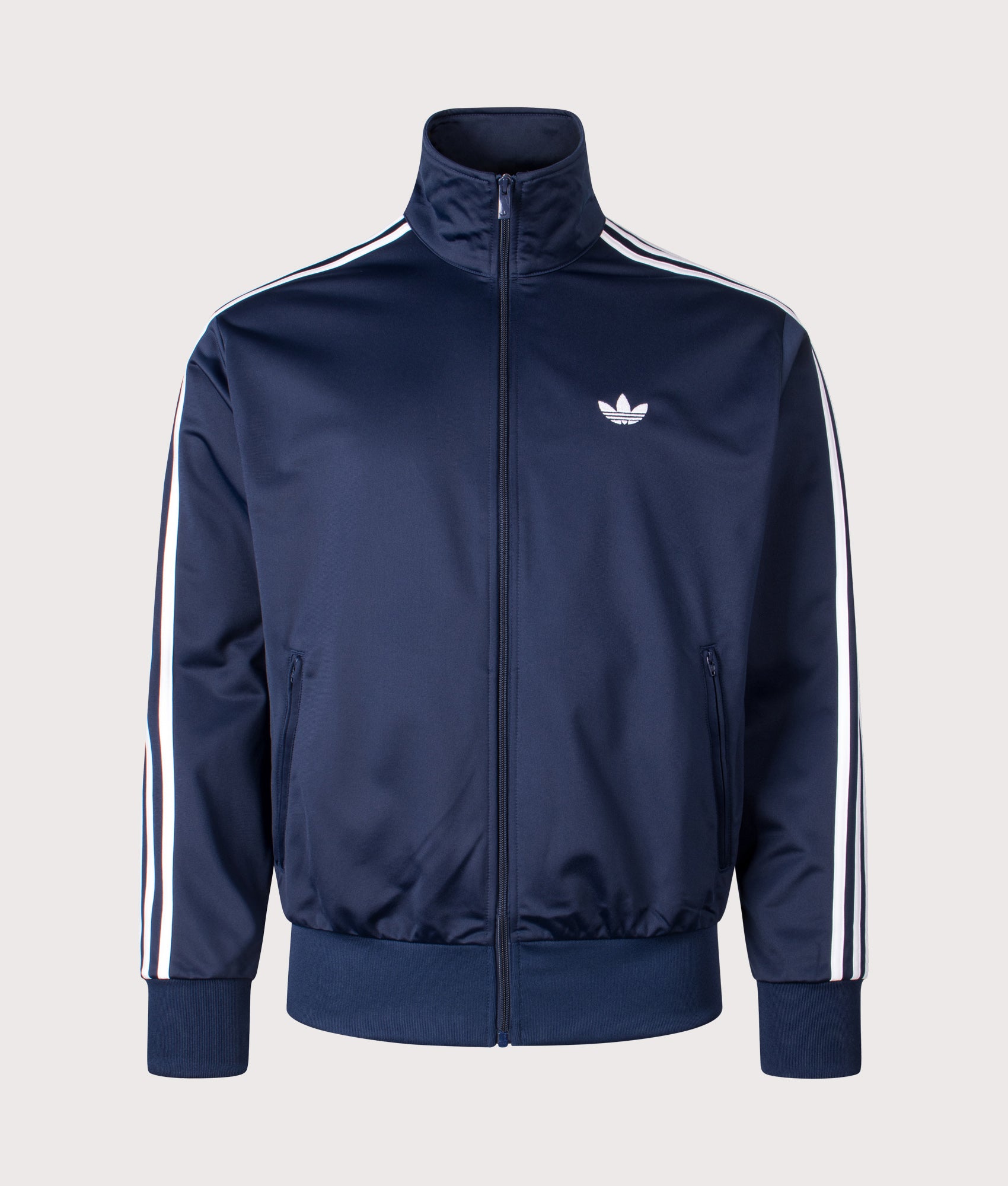 adidas Originals Firebird track top in Night Indigo at EQVVS Menswear. Front shot.