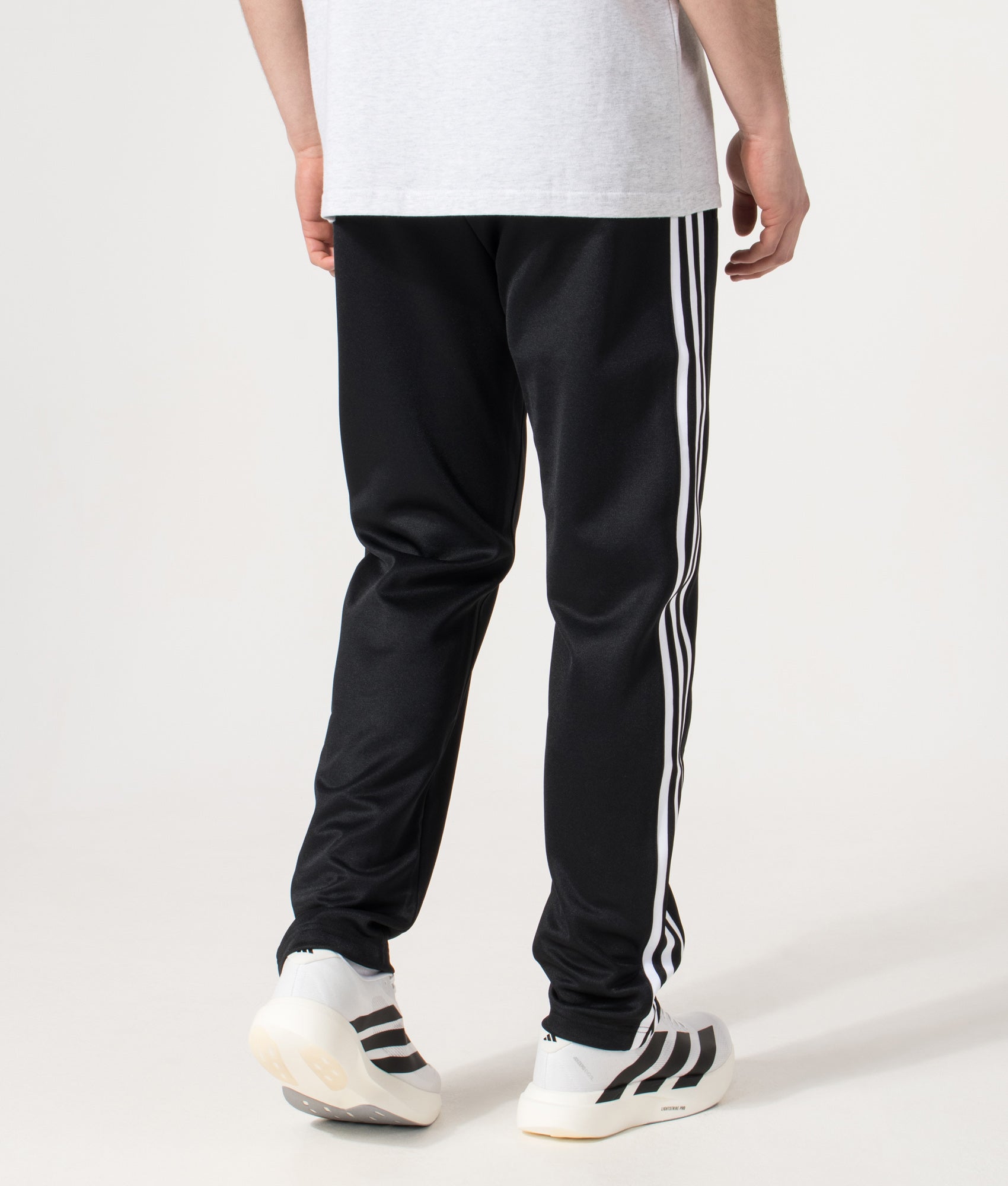 adidas Original Classic Track pant in  Black at EQVVS Menswear. Model back shot.
