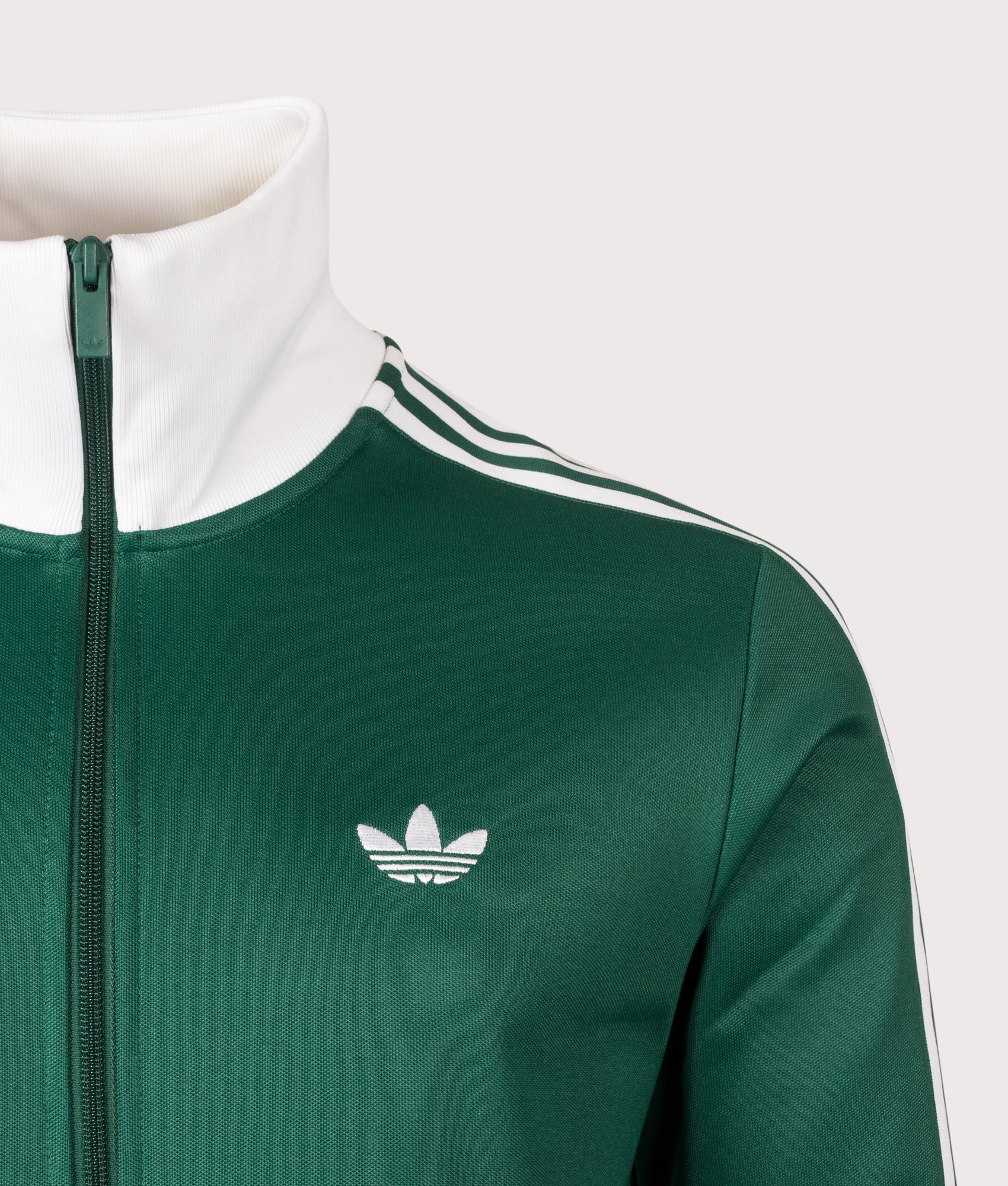 adidas Originals Beckenbauer Classic Track Top in Collegiate Green and White at EQVVS Menswear. Detail shot.