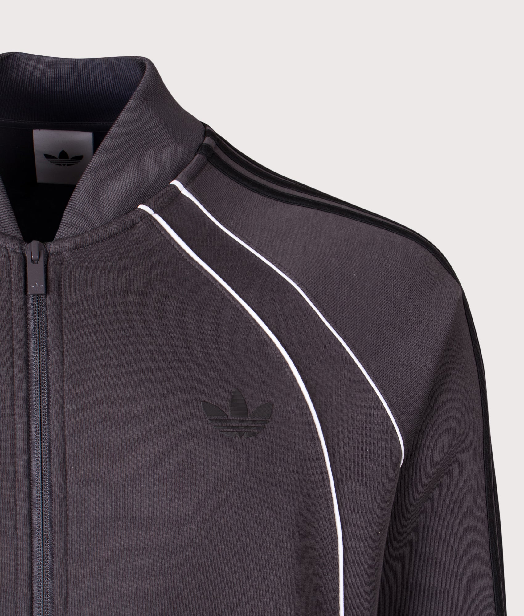 adidas Originals SST 2.0 Track Top in Anthracite Grey at EQVVS Menswear. Detail shot.