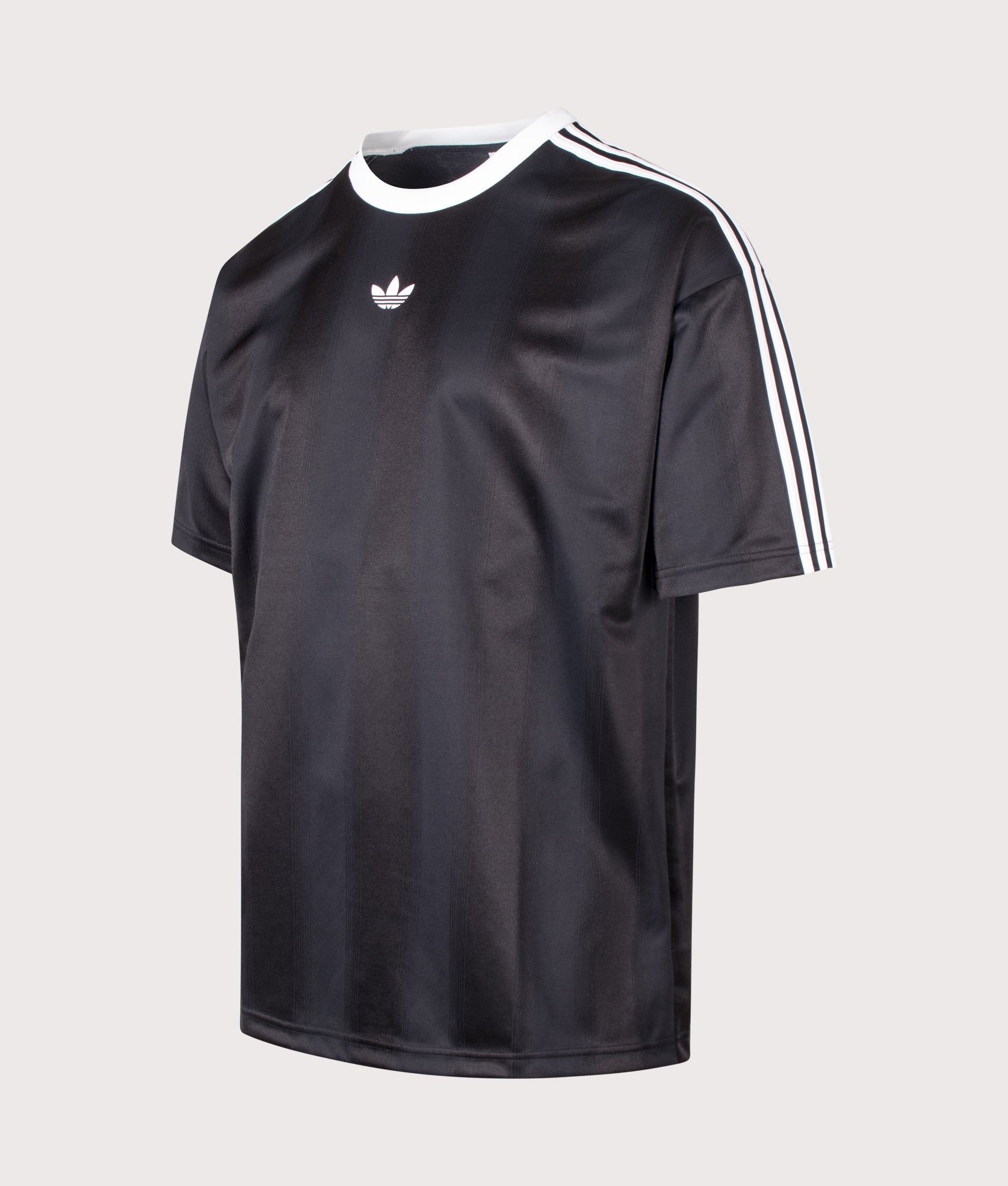 adidas Originals Oversized Fit Adicolour Jacquard Jersey T-Shirt in Black at EQVVS Menswear. Angled front shot.