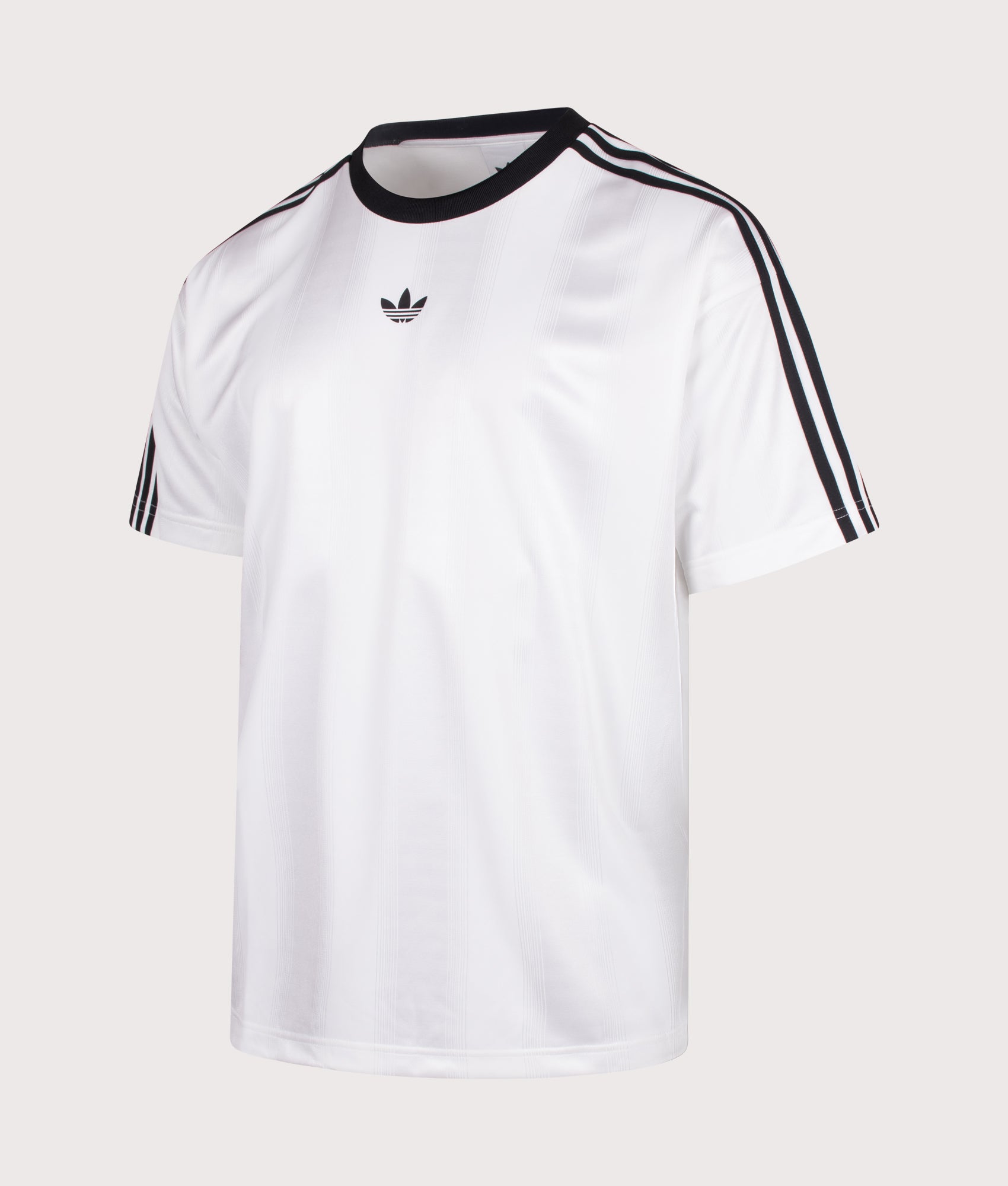 adidas Originals release the Oversized Fit Adicolour Jacquard Jersey T-Shirt in White at EQVVS Menswear. Angled front shot.