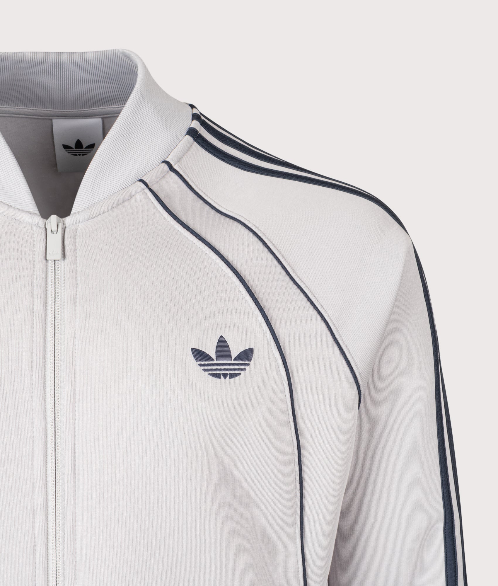 adidas Originals SST 2.0 Track Top in Grey Two at EQVVS Menswear. Detail shot.