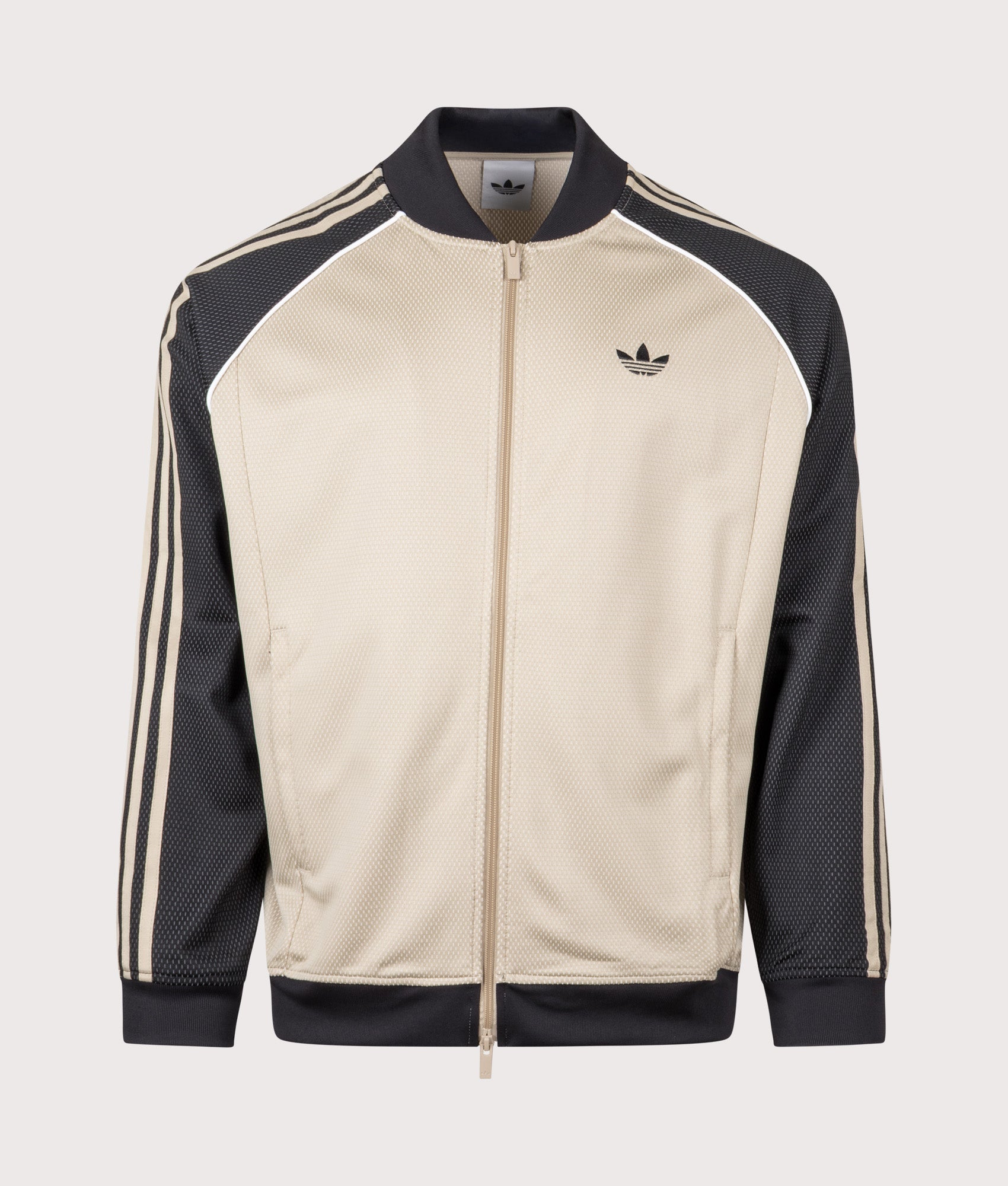 adidas Originals SST Track Top in Stone Khaki at EQVVS Menswear. Front shot.