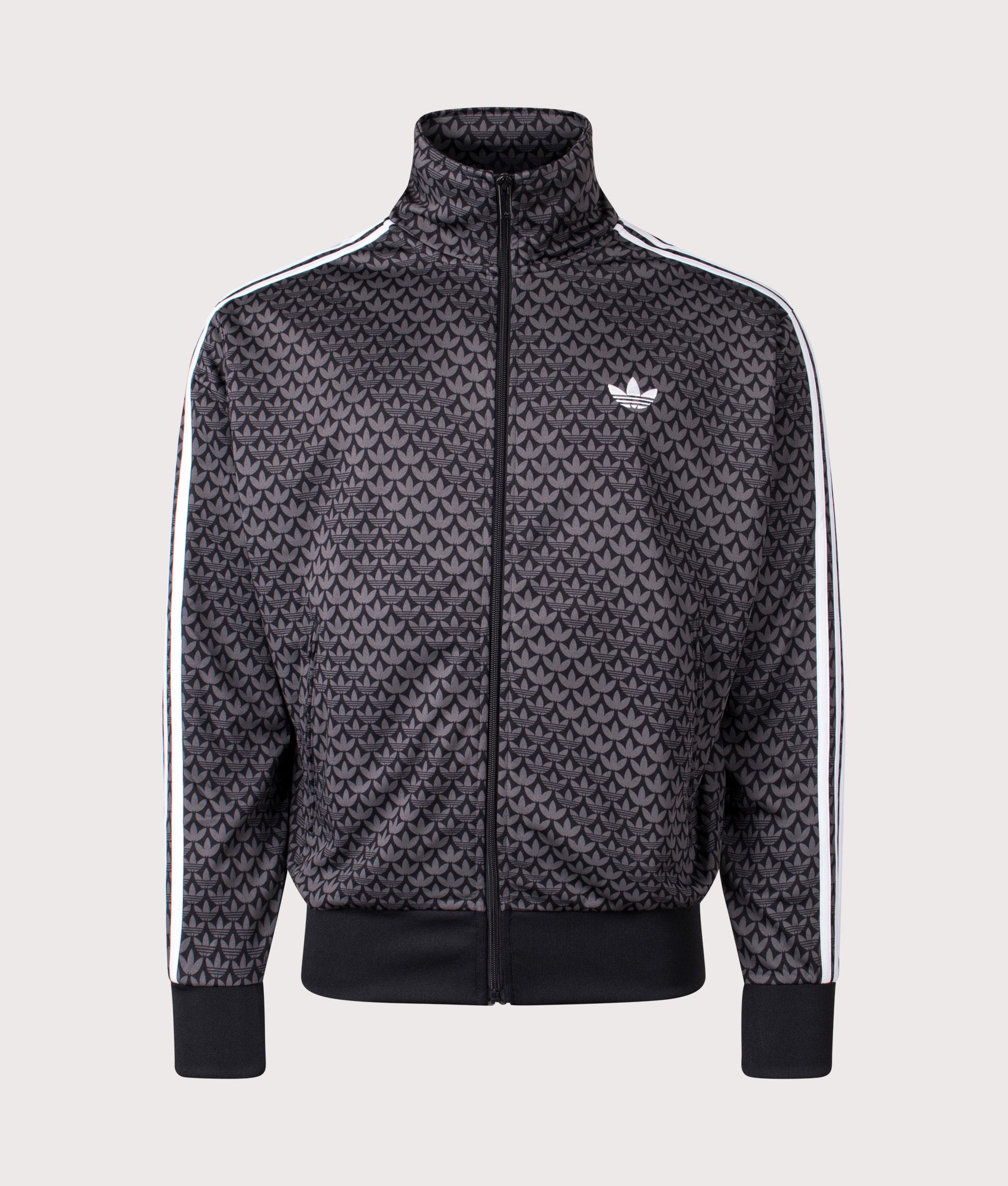 adidas Originals Firebird Monogram Track Top in Black at EQVVS Menswear. Front shot.
