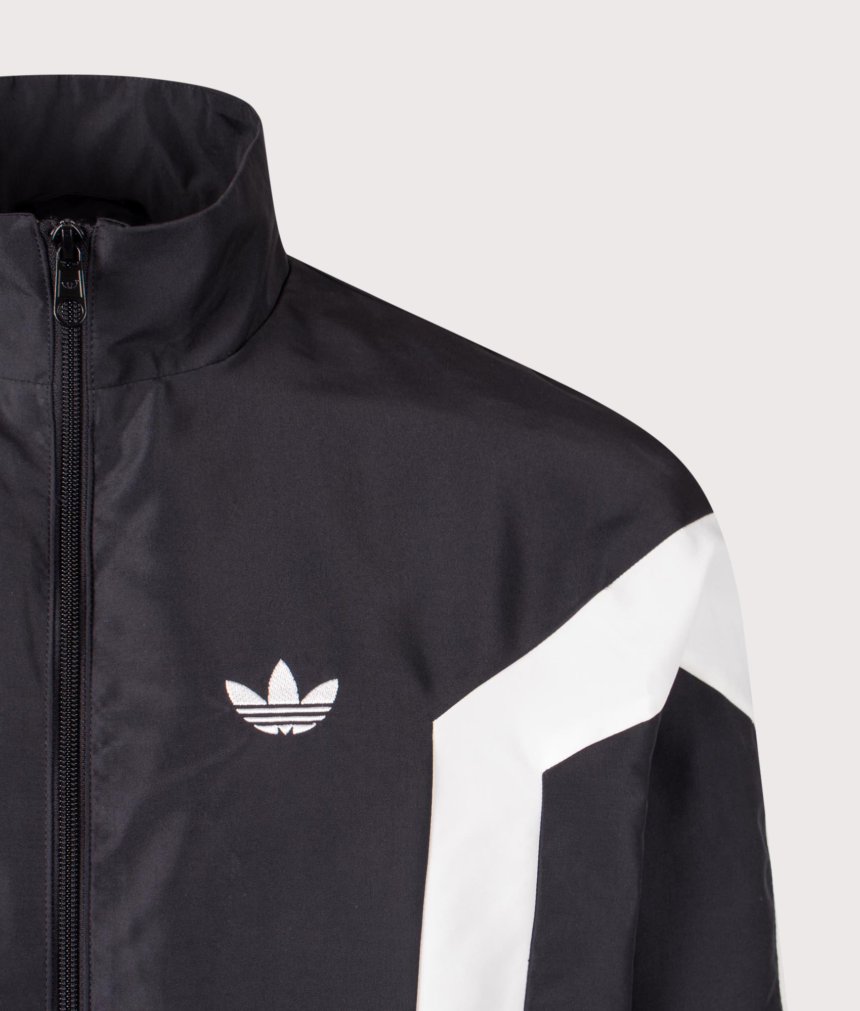 Windbreaker Jacket in Black | adidas Originals | EQVVS | Front detail shot 