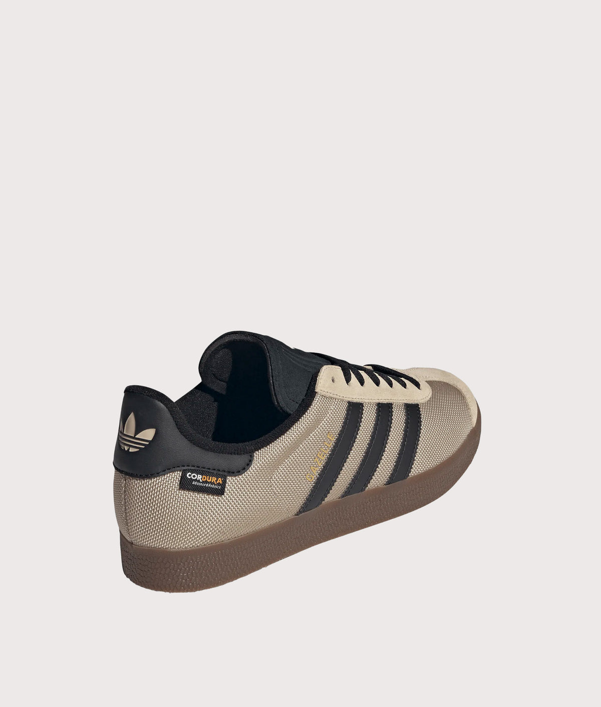 adidas Originals Cordura Gazelle Trainers in Khaki Three, Core Black and Gum 5 at EQVVS Menswear. Angled back shot.