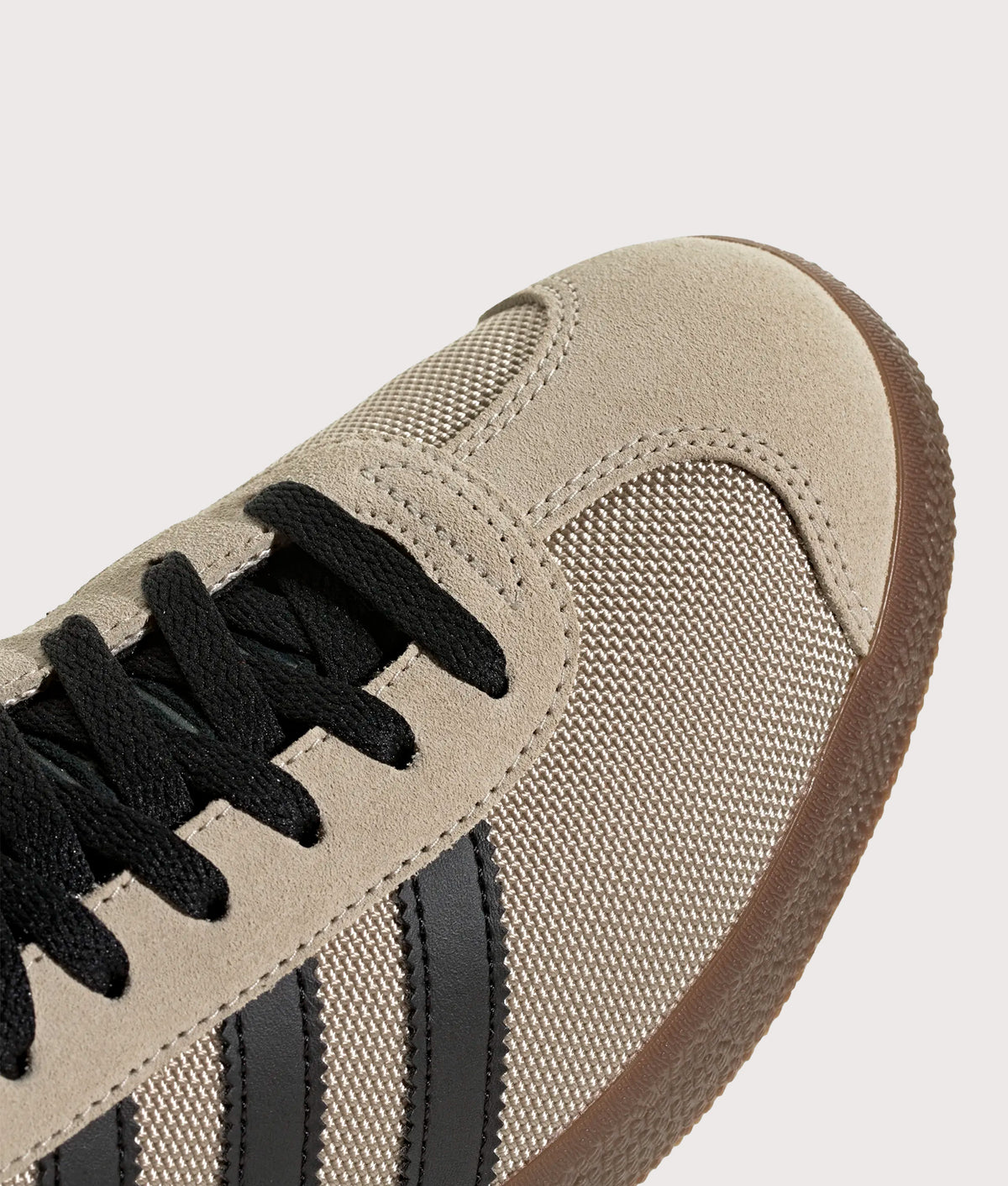 adidas Originals Cordura Gazelle Trainers in Khaki Three, Core Black and Gum 5 at EQVVS Menswear. Detail shot.