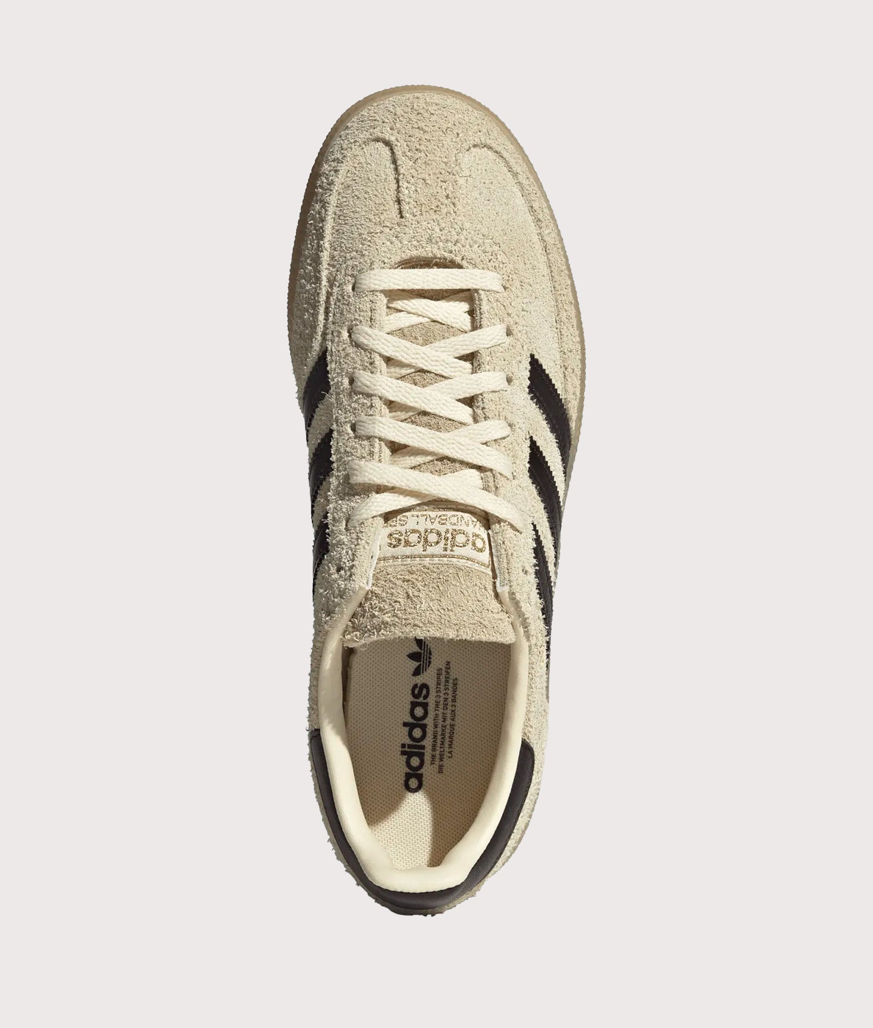 adidas Originals Handball Spezial Trainers in Warm Vanilla, Aurora Coffee and Gold Metallic at EQVVS Menswear. Top shot.