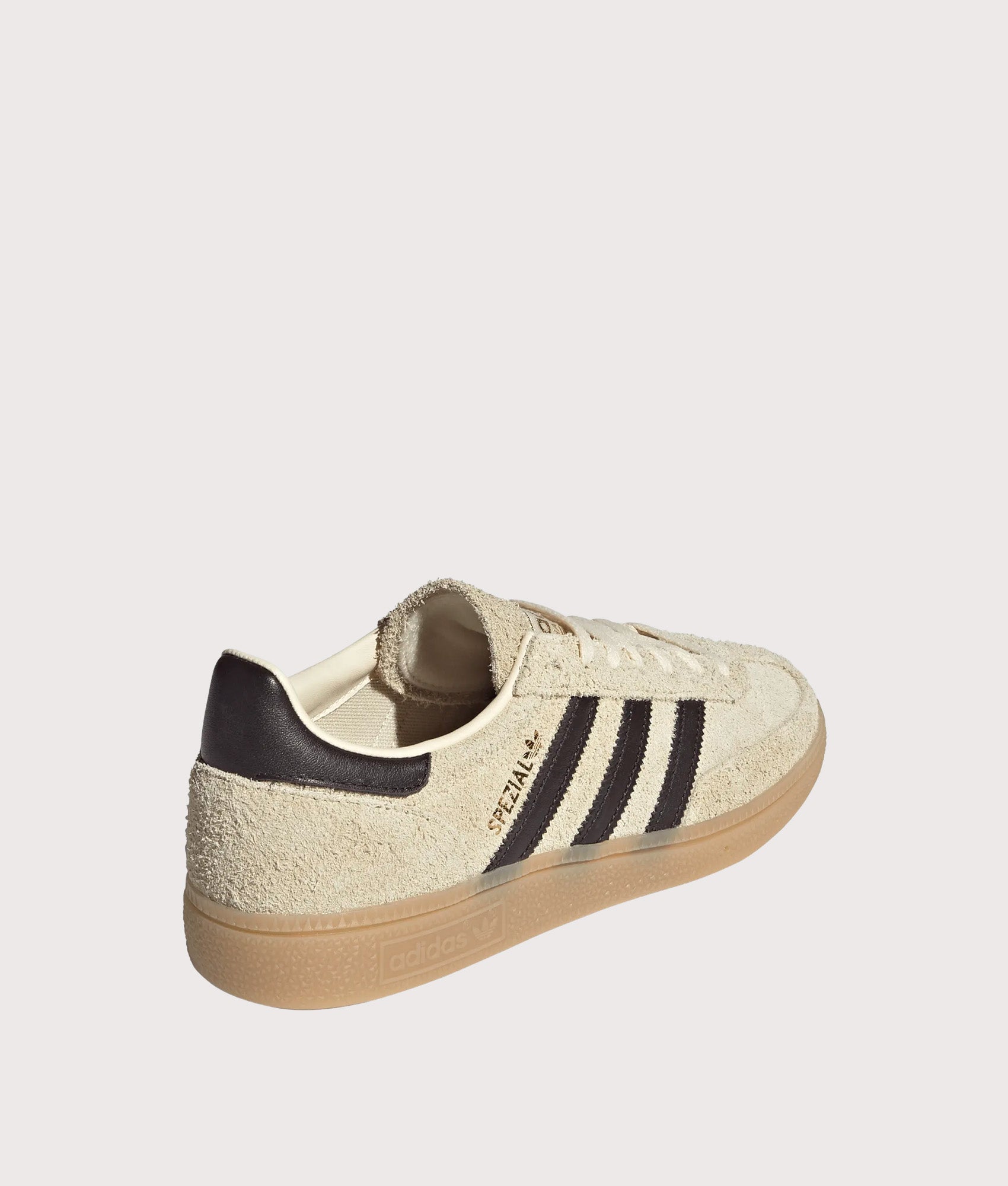 adidas Originals Handball Spezial Trainers in Warm Vanilla, Aurora Coffee and Gold Metallic at EQVVS Menswear. Angled front shot.