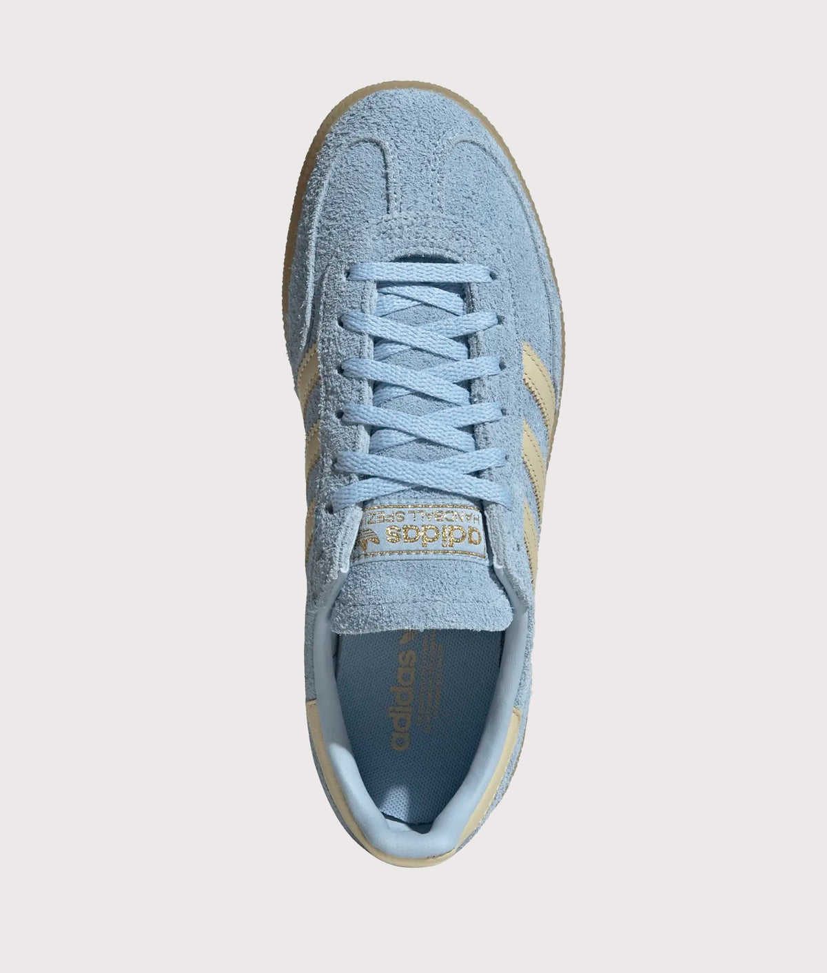adidas Originals Handball Spezial Trainers in Clear Sky, Warm Vanilla and Gold Metallic at EQVVS Menswear. Top shot.