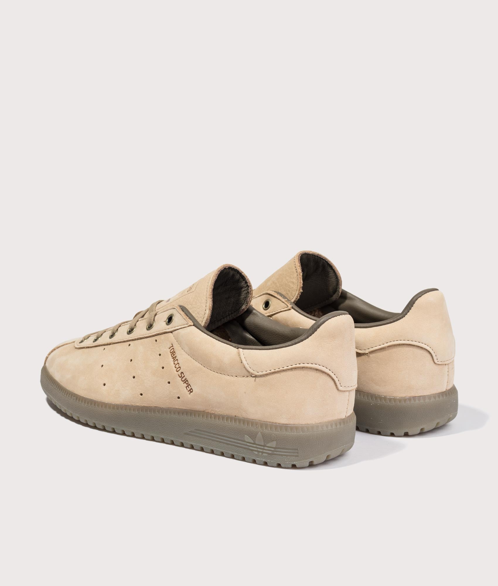 adidas Originals Tobacco Super Trainers in Warm Sandstone, Khaki Six and Cargo Brown at EQVVS Menswear. Angled back shot.