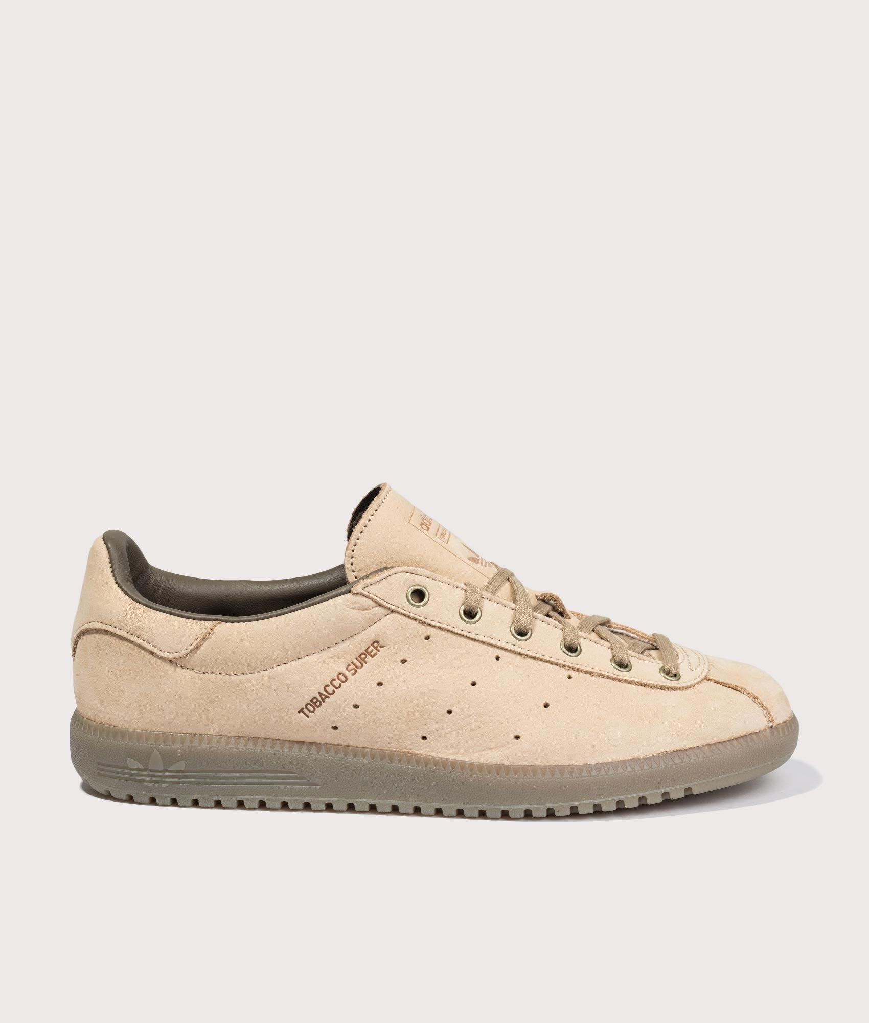 adidas Originals Tobacco Super Trainers in Warm Sandstone, Khaki Six and Cargo Brown at EQVVS Menswear. Side shot.