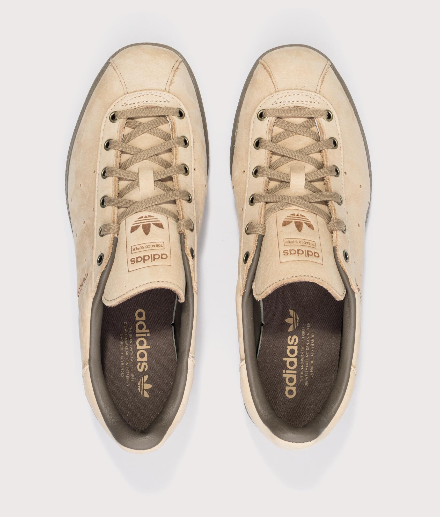 adidas Originals Tobacco Super Trainers in Warm Sandstone, Khaki Six and Cargo Brown at EQVVS Menswear. Top shot.