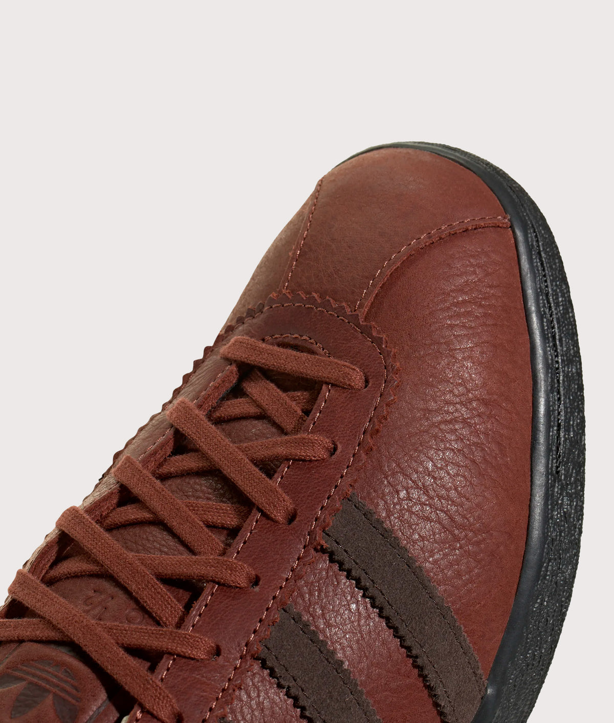  adidas Original Tobacco Trainers in Burnt Sienna, Dark Brown and Core Black at EQVVS Menswear. Detail shot.