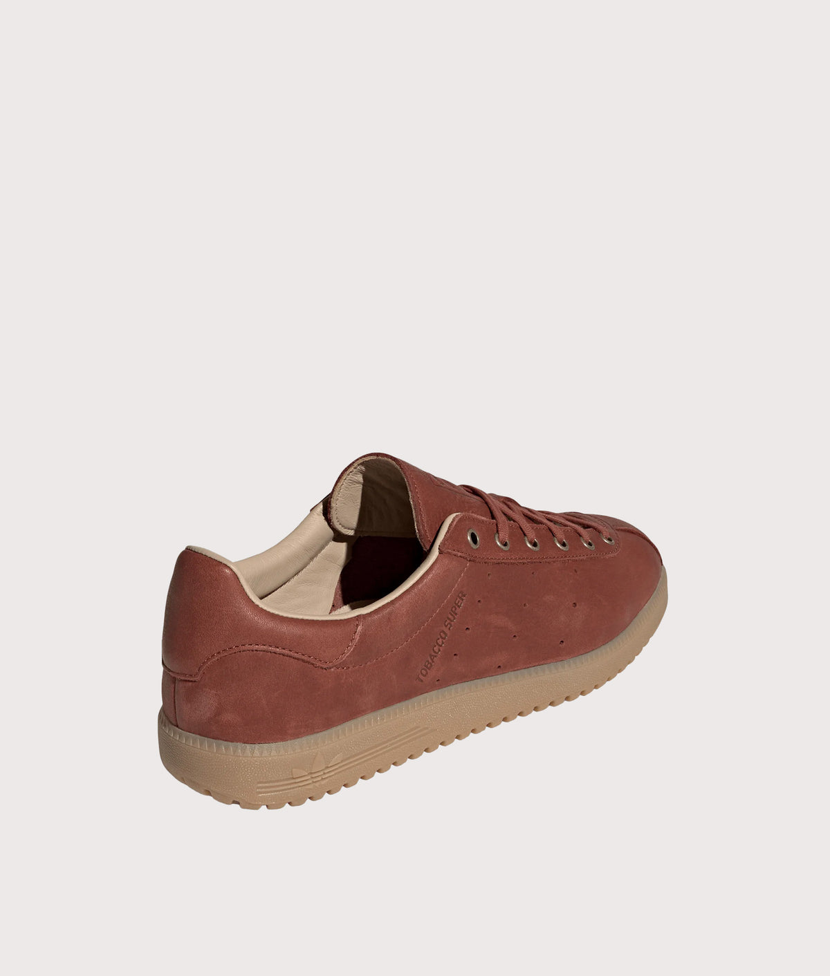 adidas Originals Tobacco Super Trainers in Fox Brown and Gum 4 at EQVVS Menswear. Angled back shot.