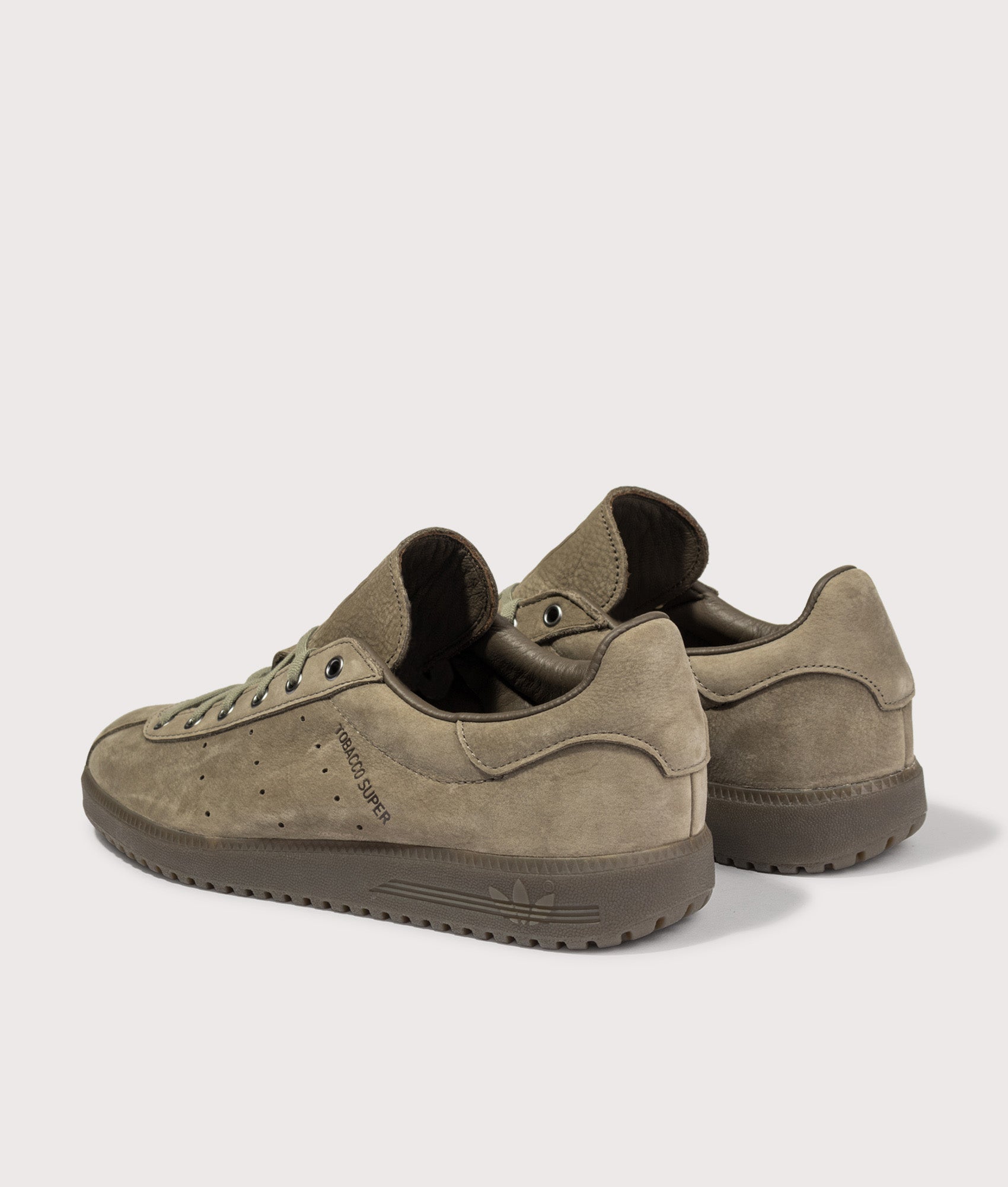adidas Originals Tobacco Super Trainers in Blanch Brown, Dust Cargo and Trace Cargo at EQVVS Menswear. Angled back shot.