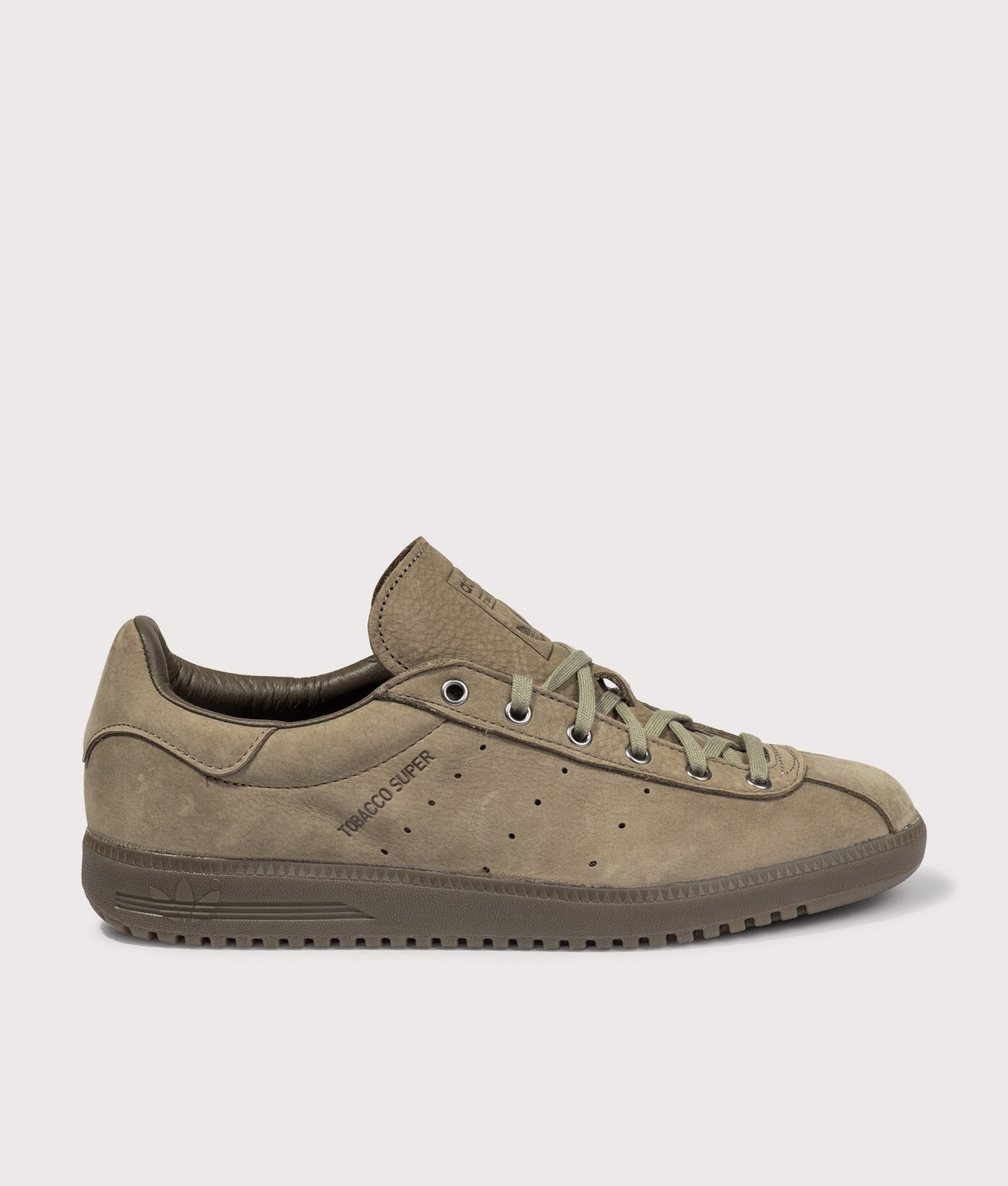 adidas Originals Tobacco Super Trainers in Blanch Brown, Dust Cargo and Trace Cargo at EQVVS Menswear. Side shot.