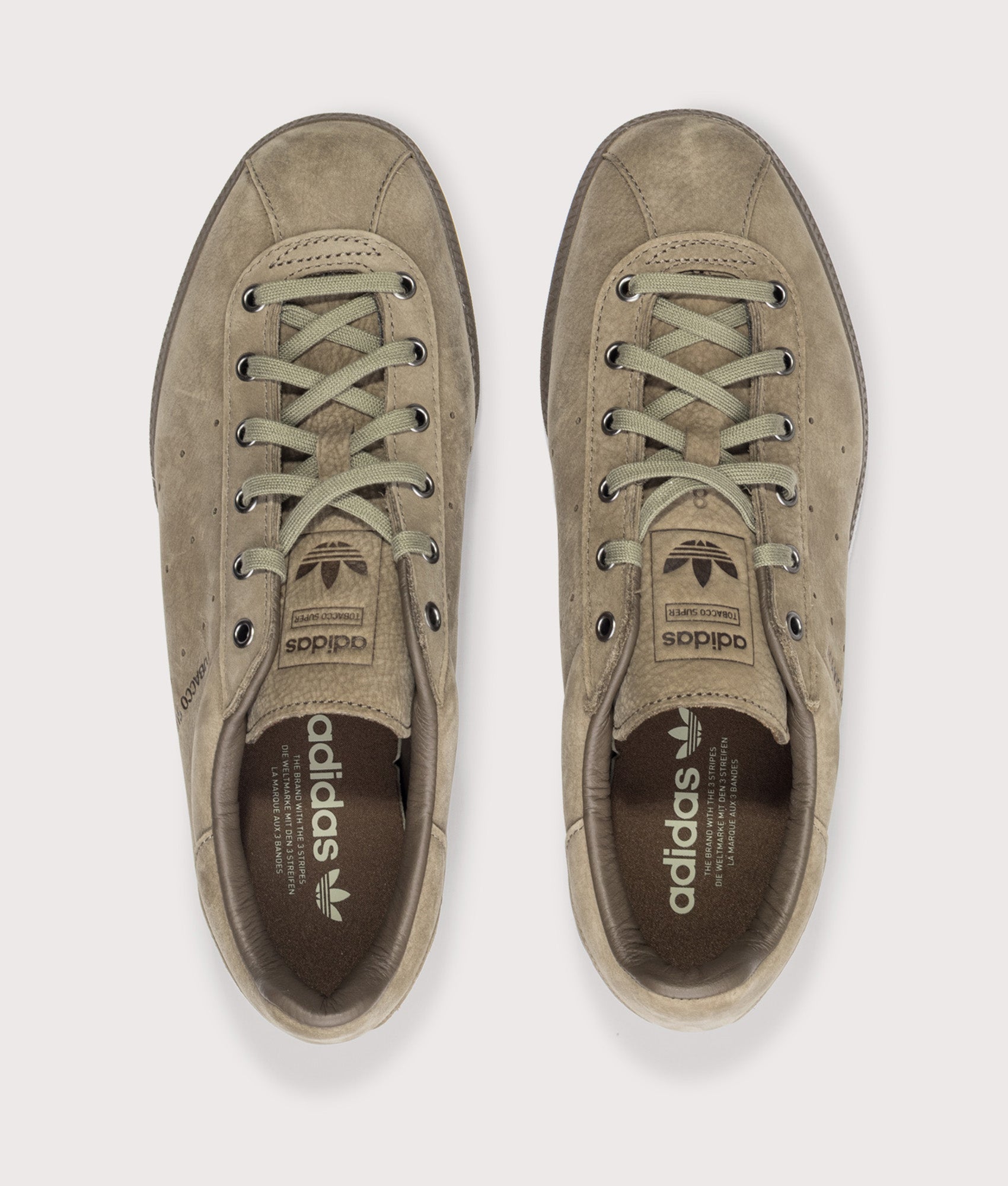 adidas Originals Tobacco Super Trainers in Blanch Brown, Dust Cargo and Trace Cargo at EQVVS Menswear. Top shot.