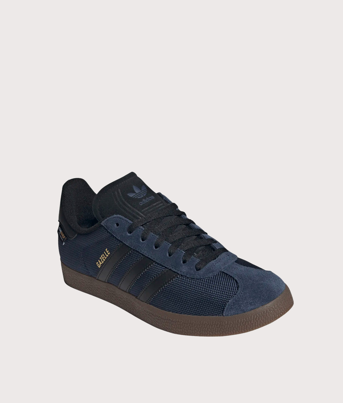 adidas Originals Cordura Gazelle Trainers in Night Indigo, Core Black and Gum 5 at EQVVS Menswear. Angled front shot.