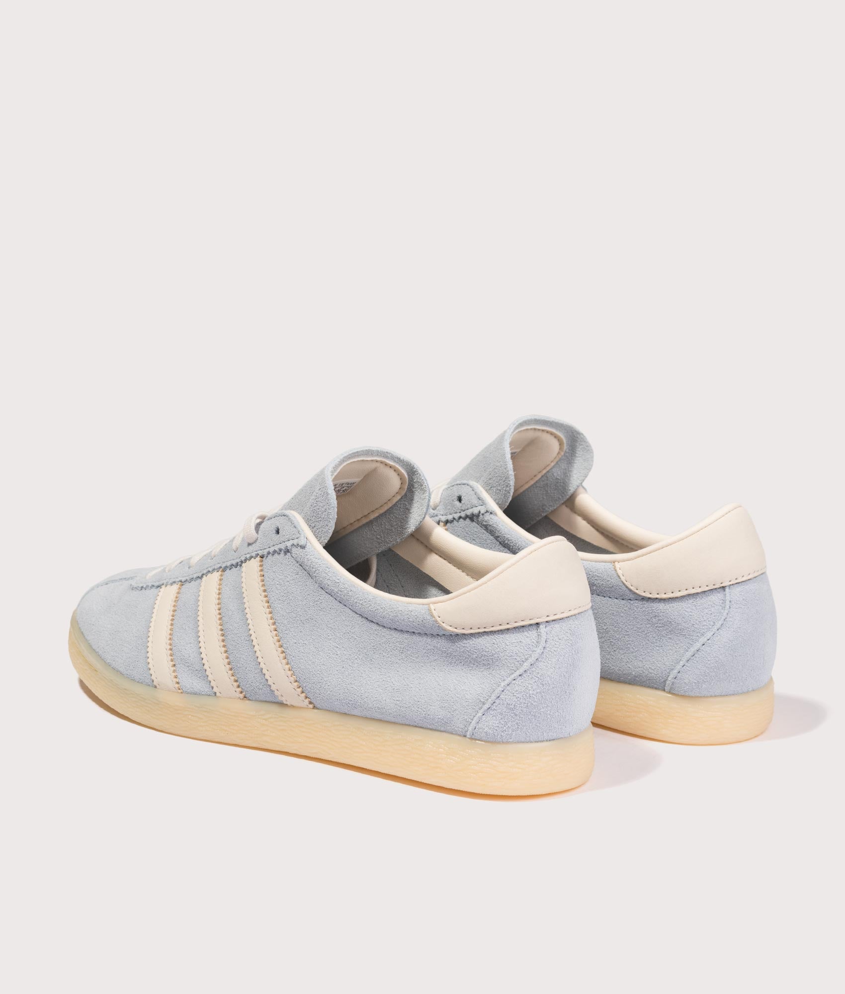 adidas Original Tobacco Trainers in Clear Sky, Chalk White and Almost Yellow at EQVVS Menswear. Angled back shot.