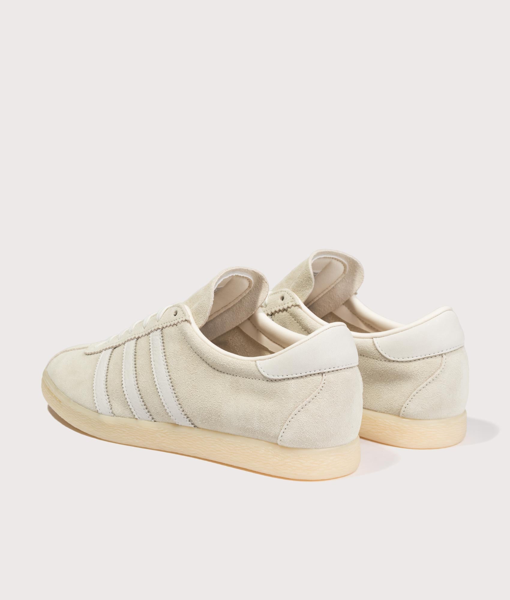adidas Original Tobacco Trainers in Warm Vanilla, Off White and Almost Yellow at EQVVS Menswear. Angled back shot.