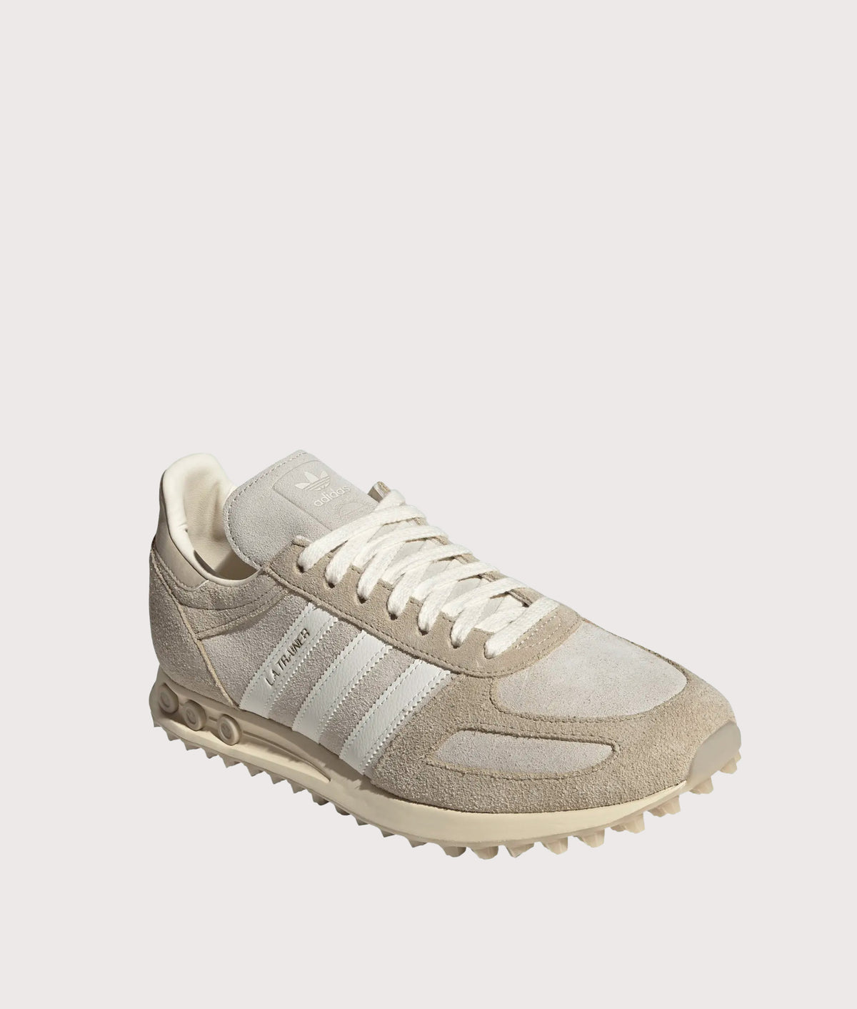 adidas Originals LA Trainer OG in Khaki Three, Off White and Matte Gold at EQVVS Menswear. Angled front shot.