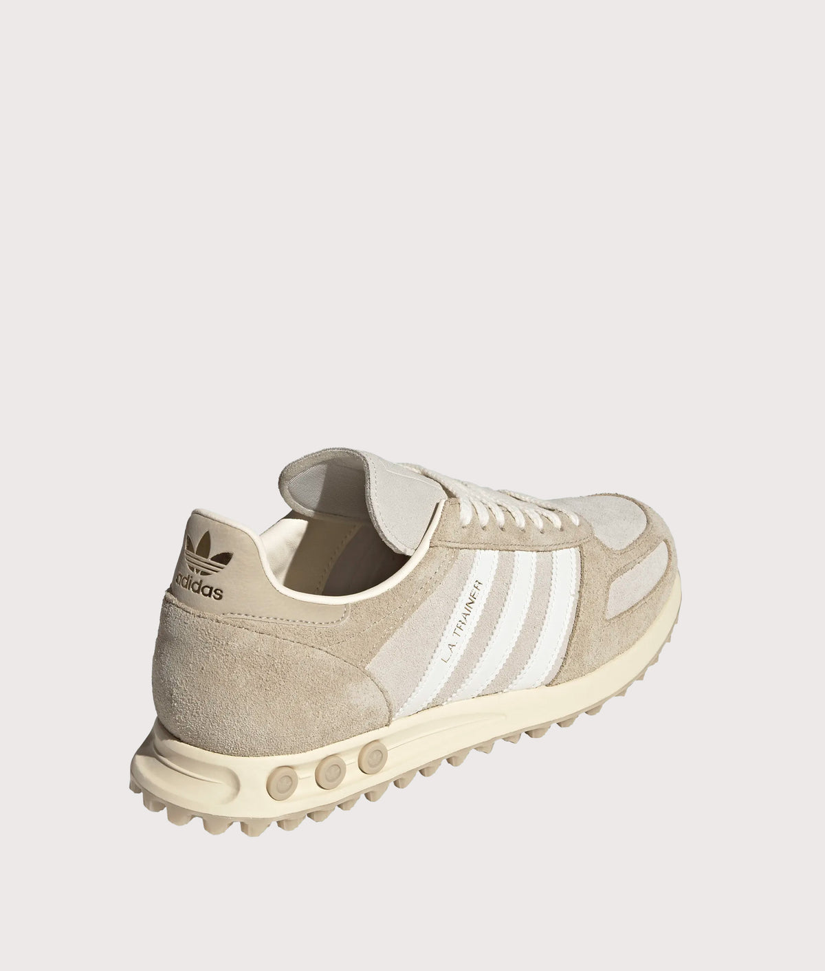 adidas Originals LA Trainer OG in Khaki Three, Off White and Matte Gold at EQVVS Menswear. Angled back shot.