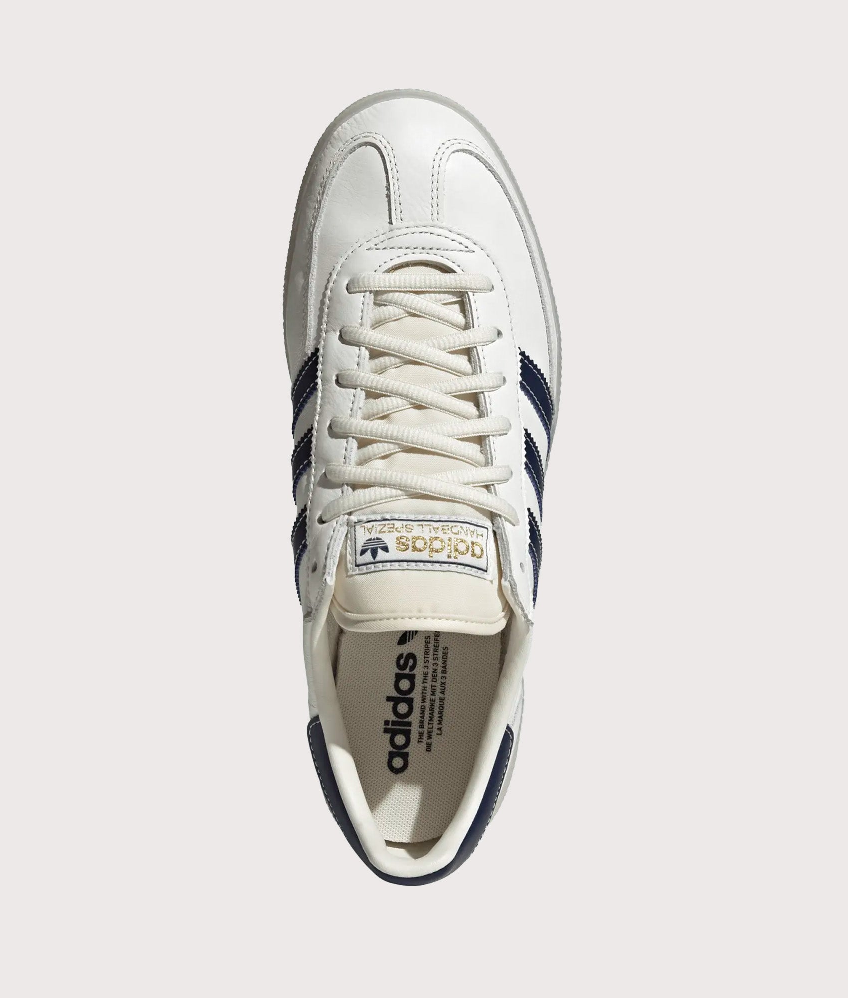 adidas Originals Handball Spezial Trainers in Core White, Night Indigo and Off White at EQVVS Menswear. Top shot.
