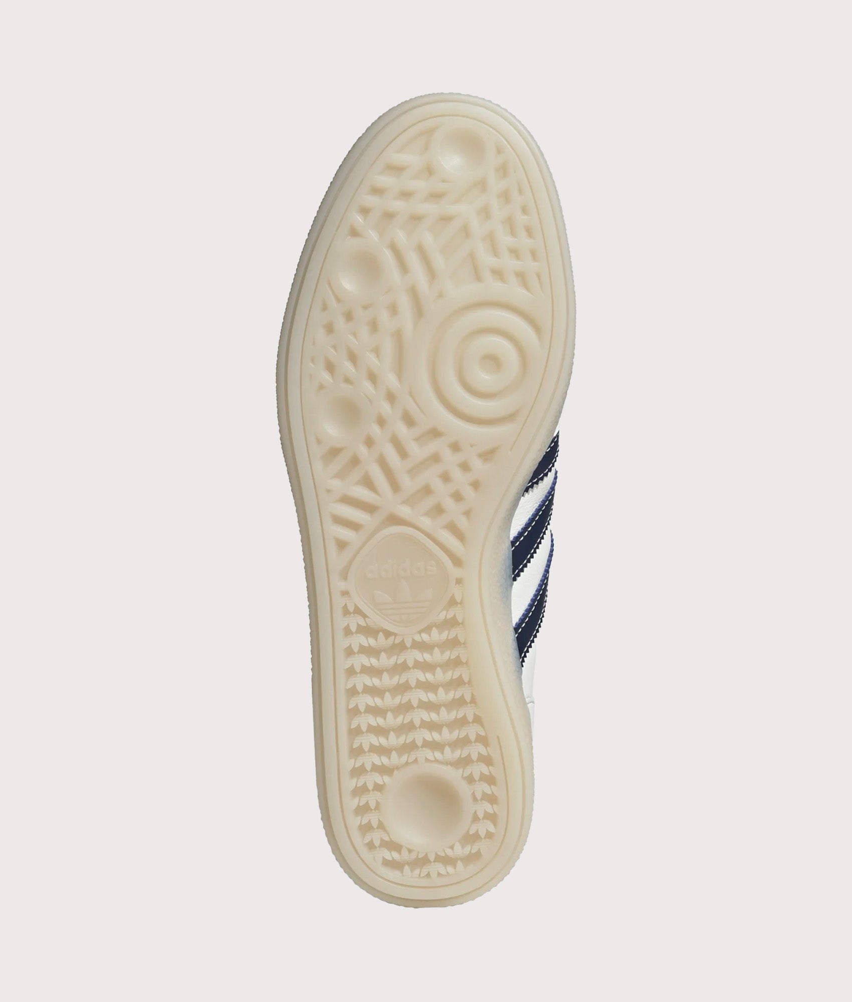 adidas Originals Handball Spezial Trainers in Core White, Night Indigo and Off White at EQVVS Menswear. Tread shot.