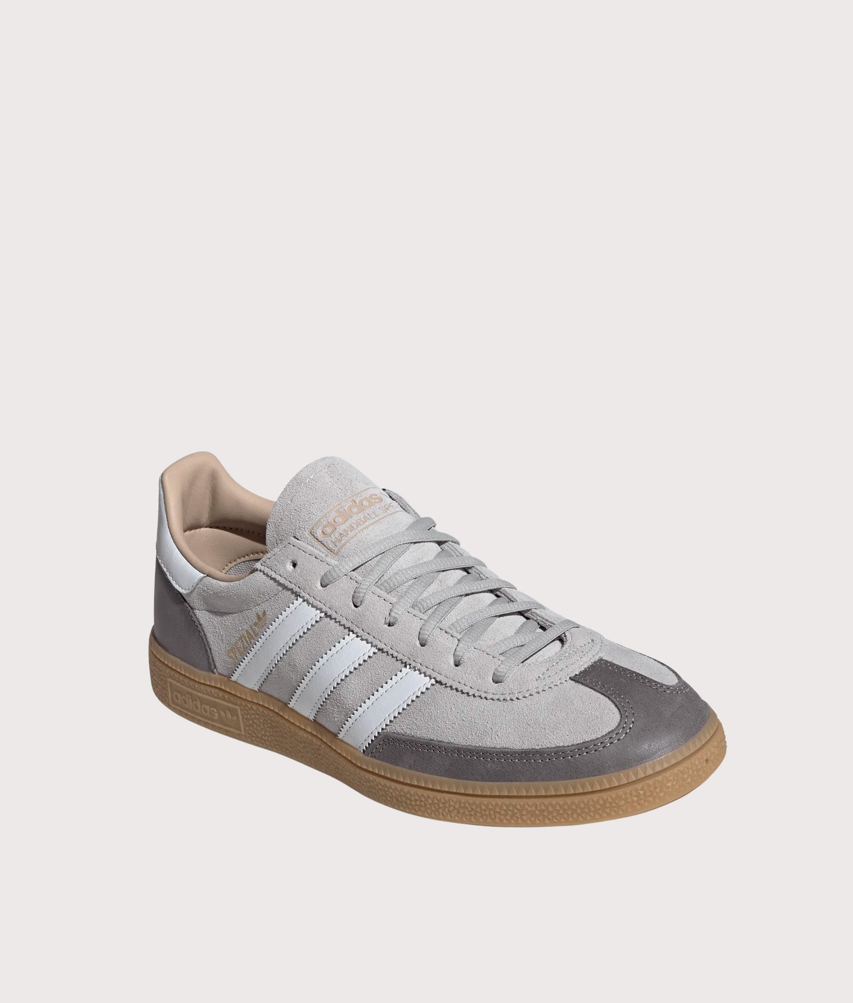 adidas Originals Handball Spezial Trainers in Grey Two, Footwear White and Gum 4 at EQVVS Menswear. Angled front shot.