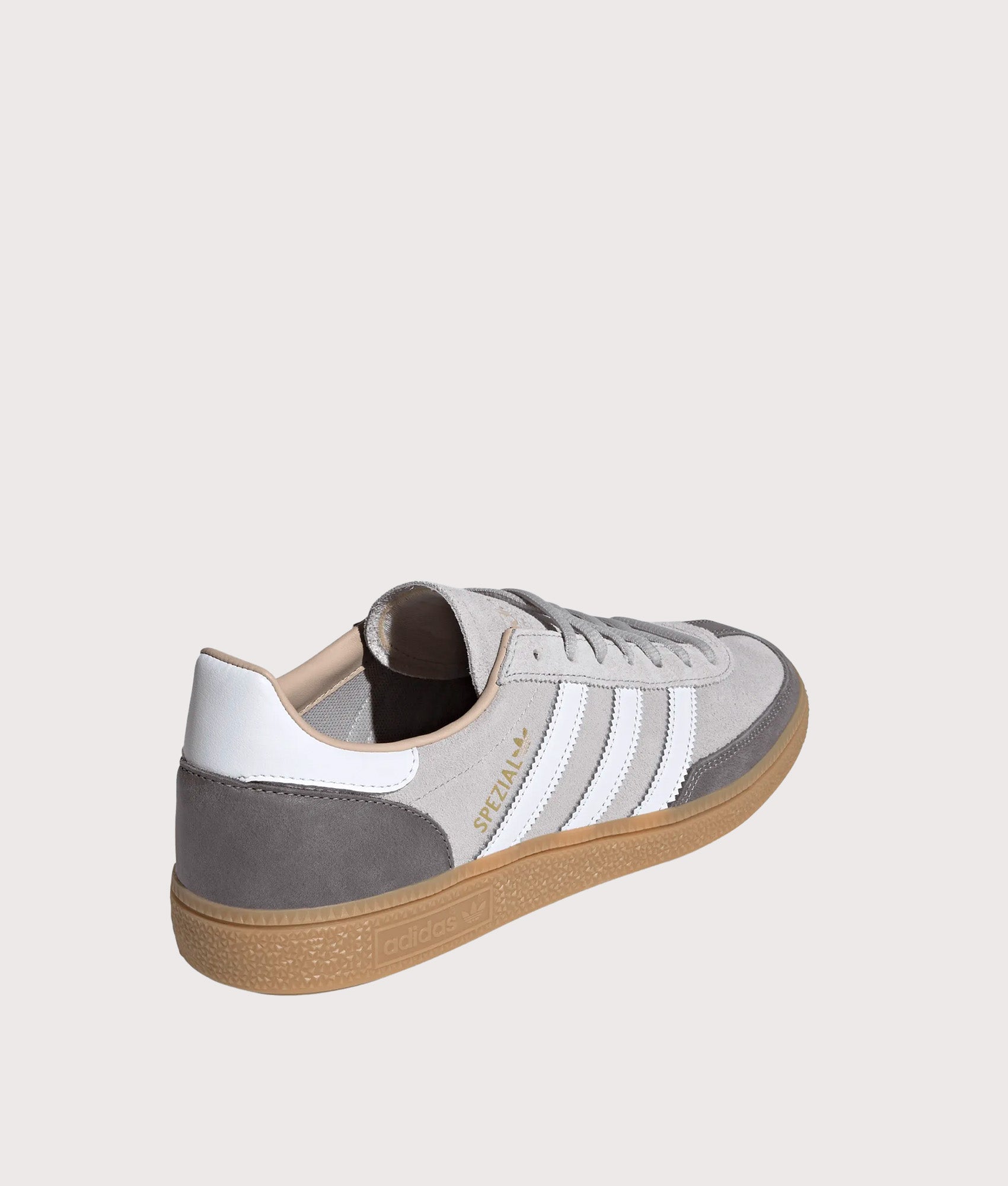 adidas Originals Handball Spezial Trainers in Grey Two, Footwear White and Gum 4 at EQVVS Menswear. Angled back shot.