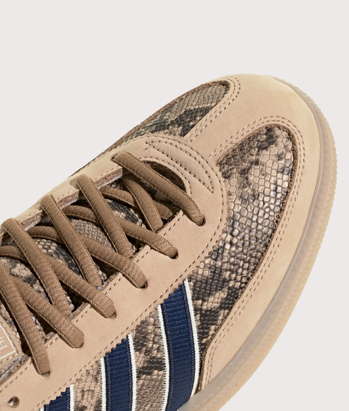 adidas Originals Snake Print Handball Spezial Trainers in Warm Sandstone, Dark Blue and Cardboard at EQVVS Menswear. Detail Shot