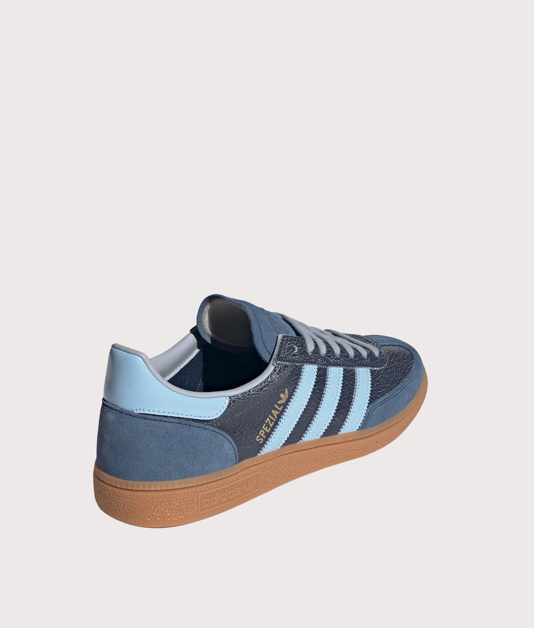 adidas Originals Handball Spezial Trainers in Night Indigo, Clear Sky and Gum 2 at EQVVS Menswear. Angled shot.