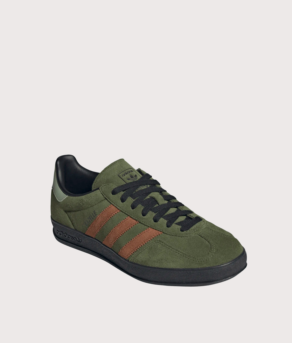 adidas Originals Gazelle Indoor Trainers in Wild Pine, Dusky Bronze and Core Black at EQVVS Menswear. Angled front shot.