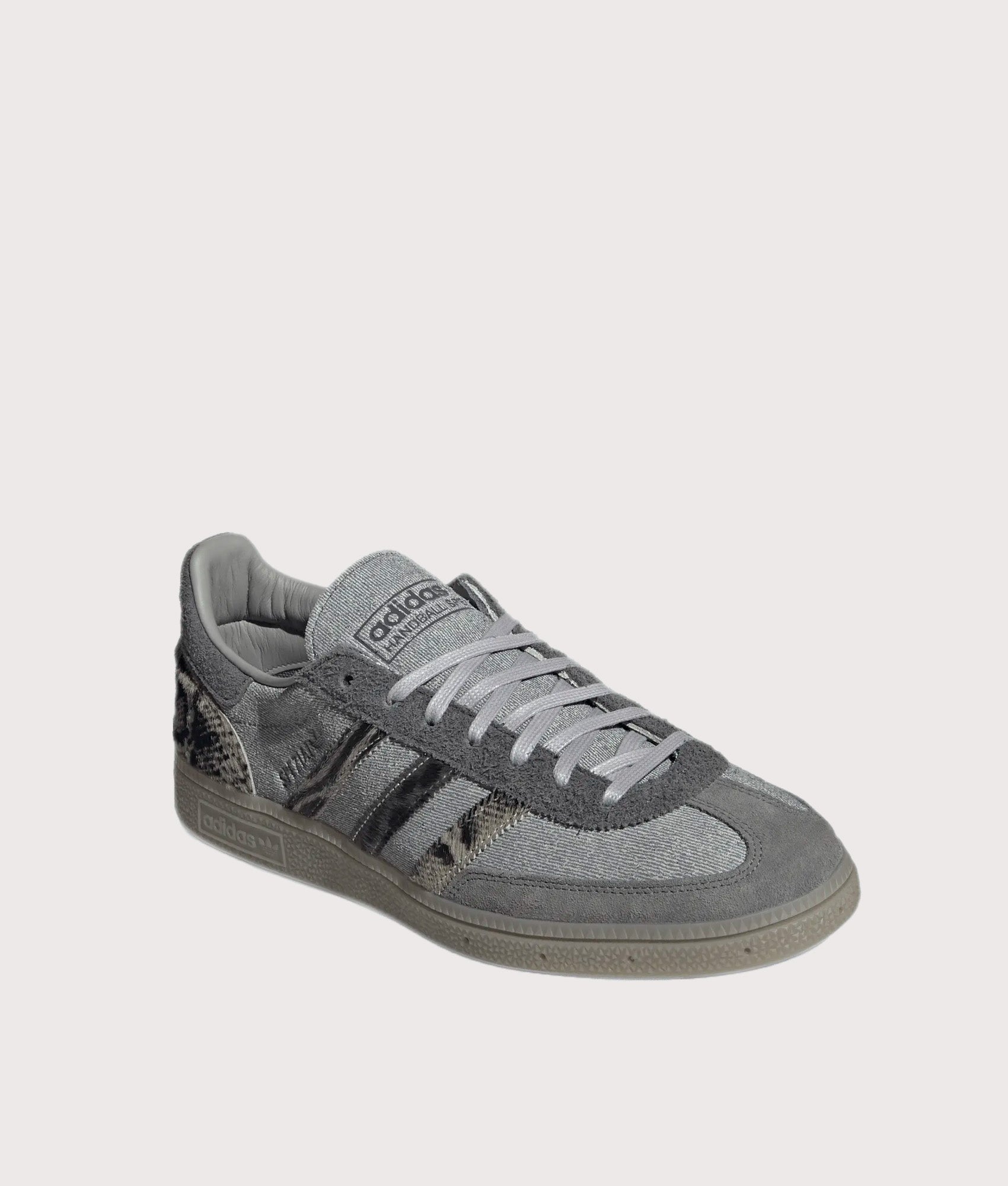 adidas Originals Handball Spezial Trainers in Legacy Blue, Grey Two and Core Black at EQVVS Menswear. Angled front shot.