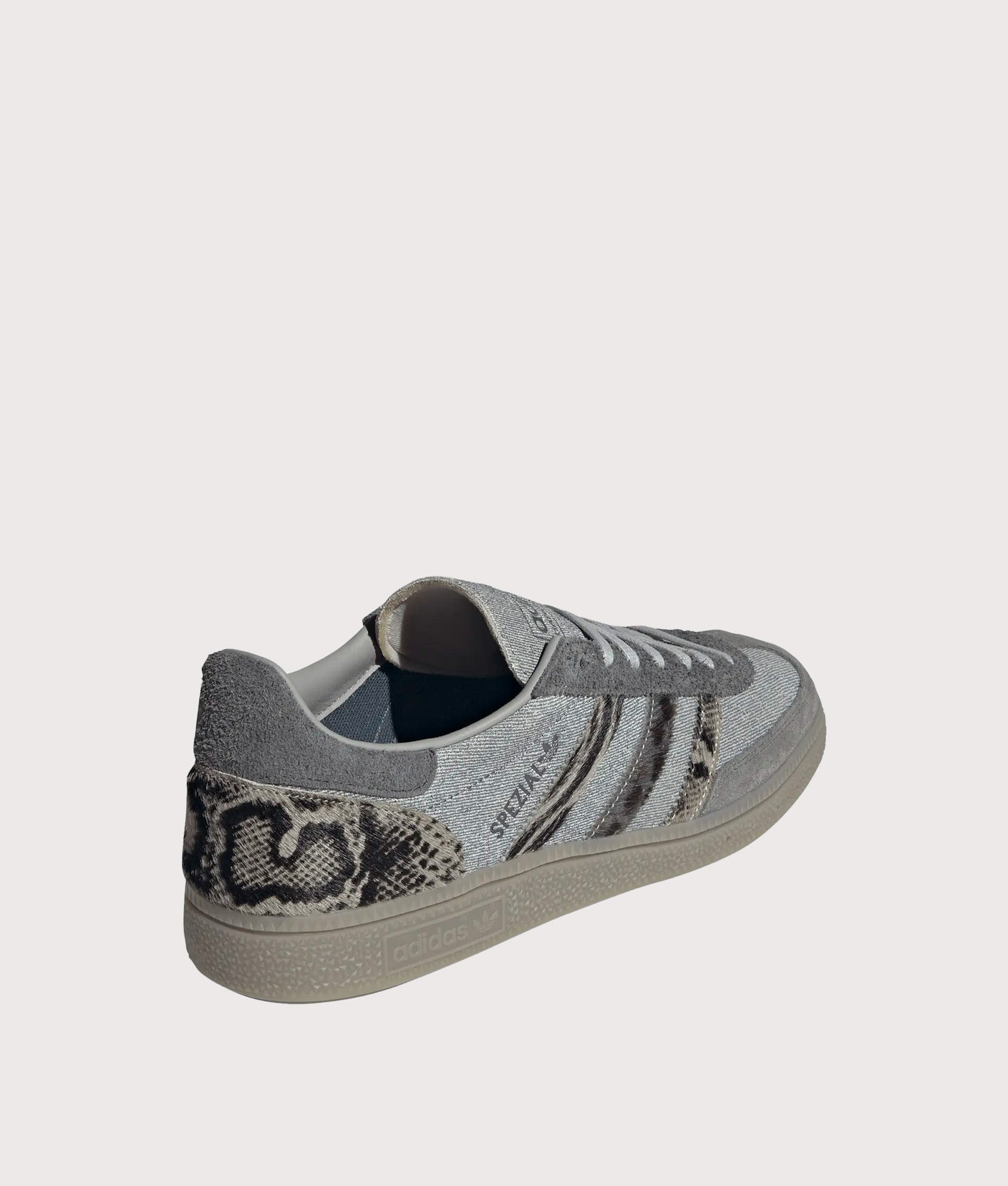 adidas Originals Handball Spezial Trainers in Legacy Blue, Grey Two and Core Black at EQVVS Menswear. Angled back shot.