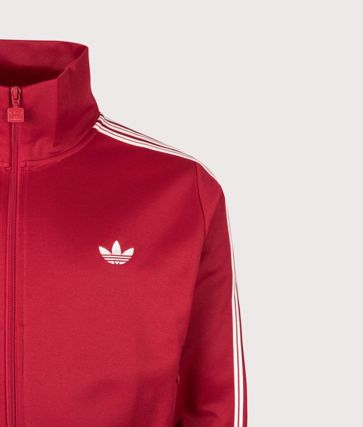 adidas Originals Beckenbauer Cropped Track Top in Red at EQVVS Menswear. Detail shot.