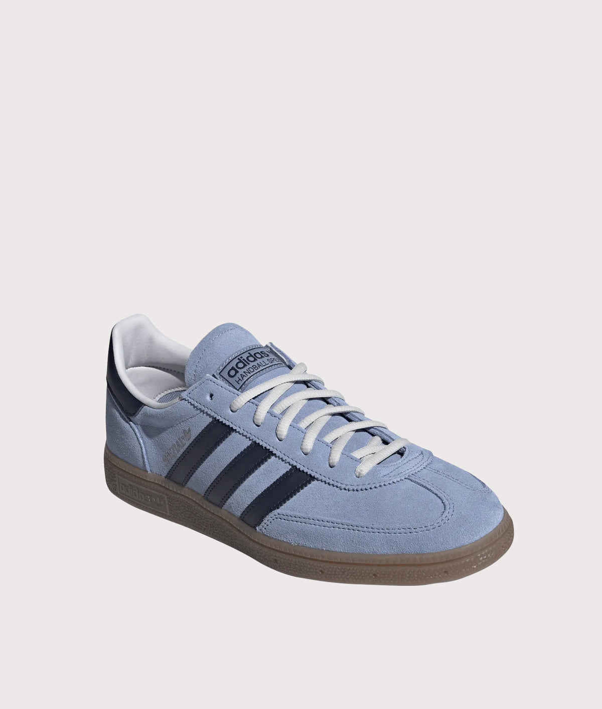 adidas Originals Handball Spezial Trainers in Chalk Blue, Legend Ink and Gum5 at EQVVS Menswear. Angled front shot.