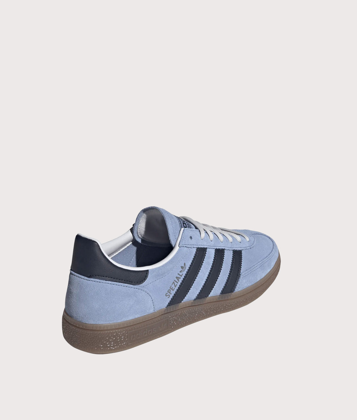 adidas Originals Handball Spezial Trainers in Chalk Blue, Legend Ink and Gum5 at EQVVS Menswear. Angled back shot.