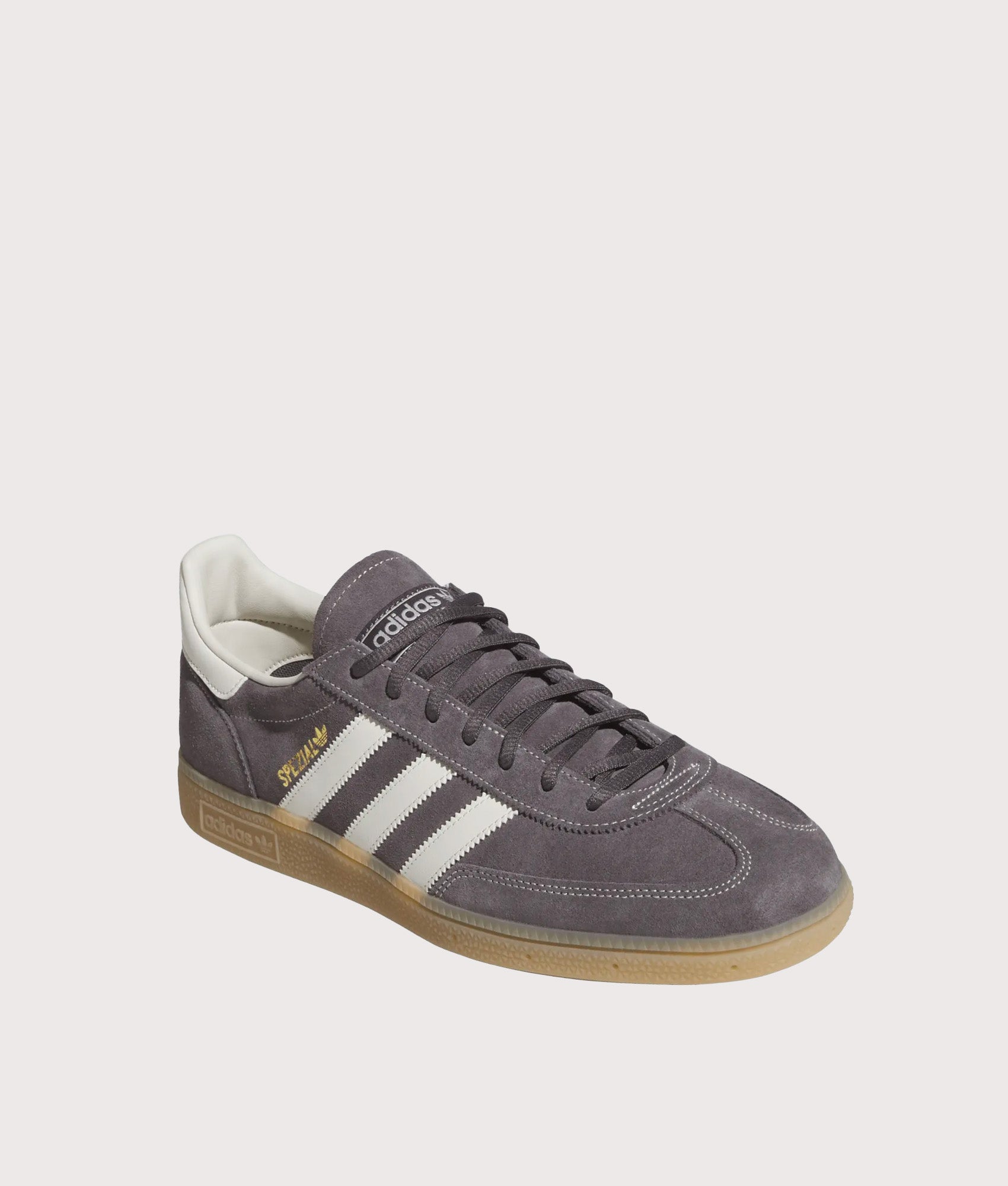 adidas Originals Handball Spezial Trainers in Grey Three, Off White and Gum 4 at EQVVS Menswear. Angled front shot.