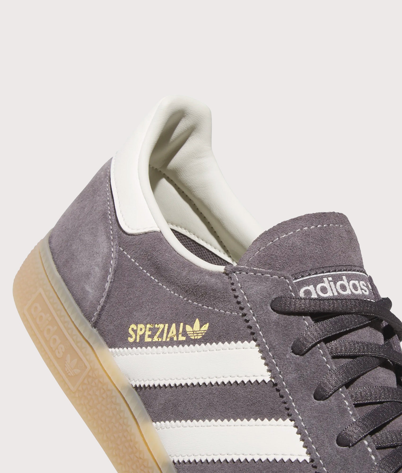 adidas Originals Handball Spezial Trainers in Grey Three, Off White and Gum 4 at EQVVS Menswear. Detail shot.