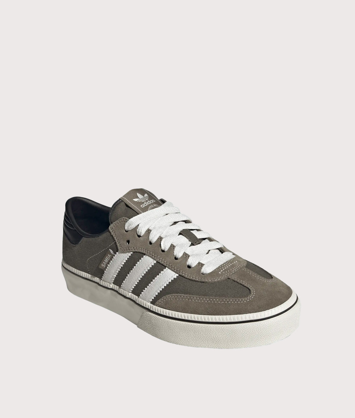 adidas Originals Samba ST Trainers in Olive Strata, Cloud White and Core Black colourway at EQVVS Menswear. Angled front shot.