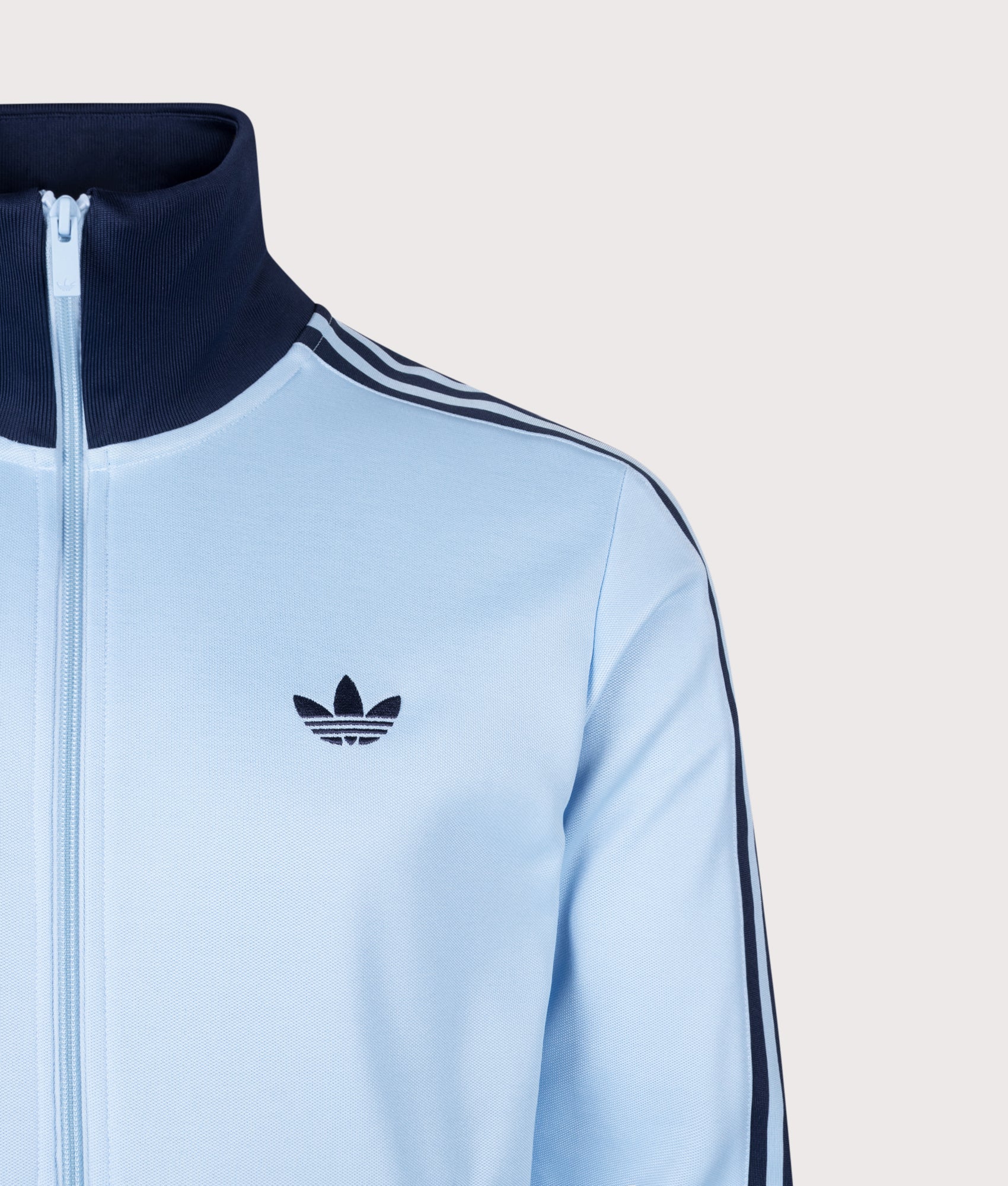 adidas Originals Beckenbauer Classic Track Top in Clear Sky and Night Indigo at EQVVS Menswear. Detail shot.